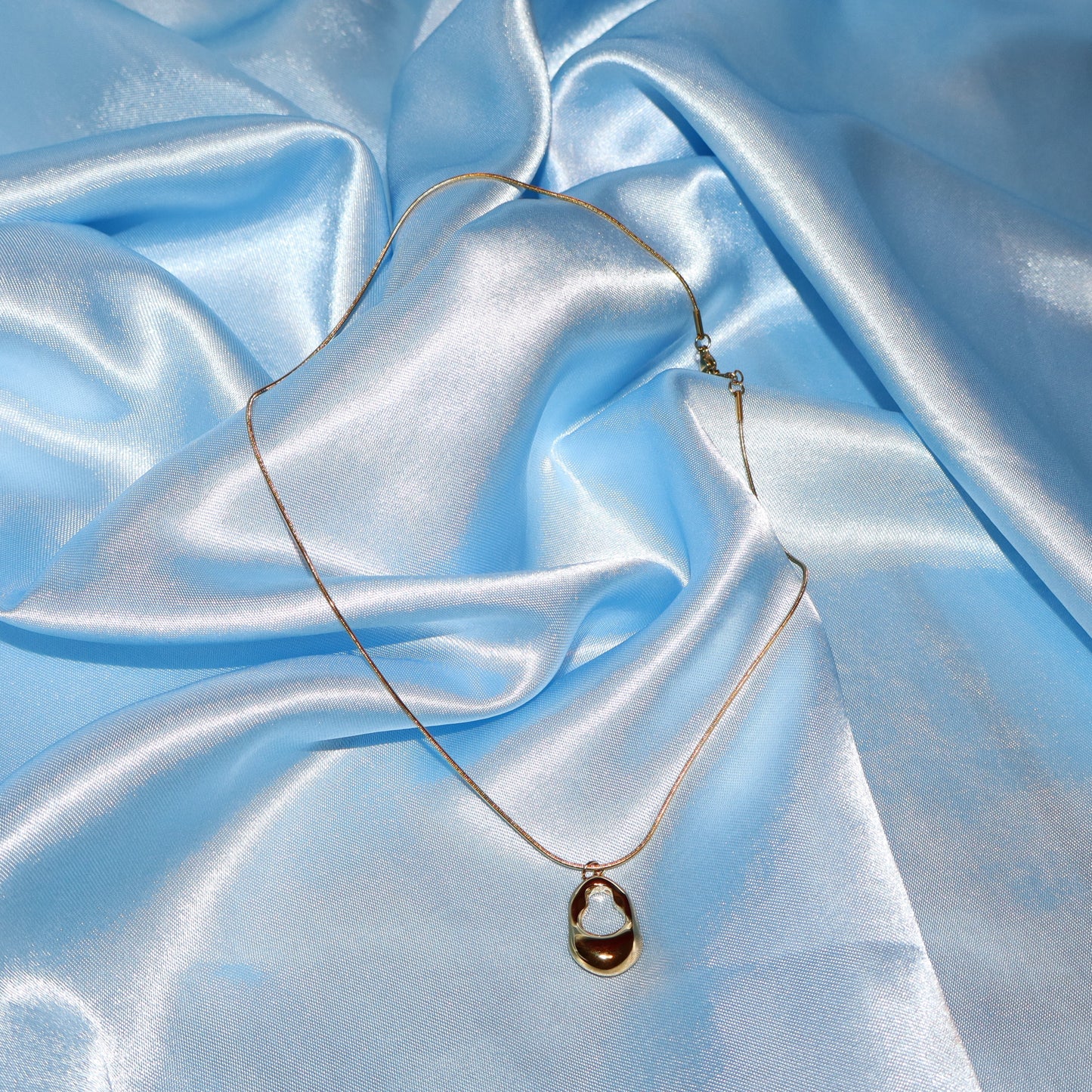 gold open oval necklace