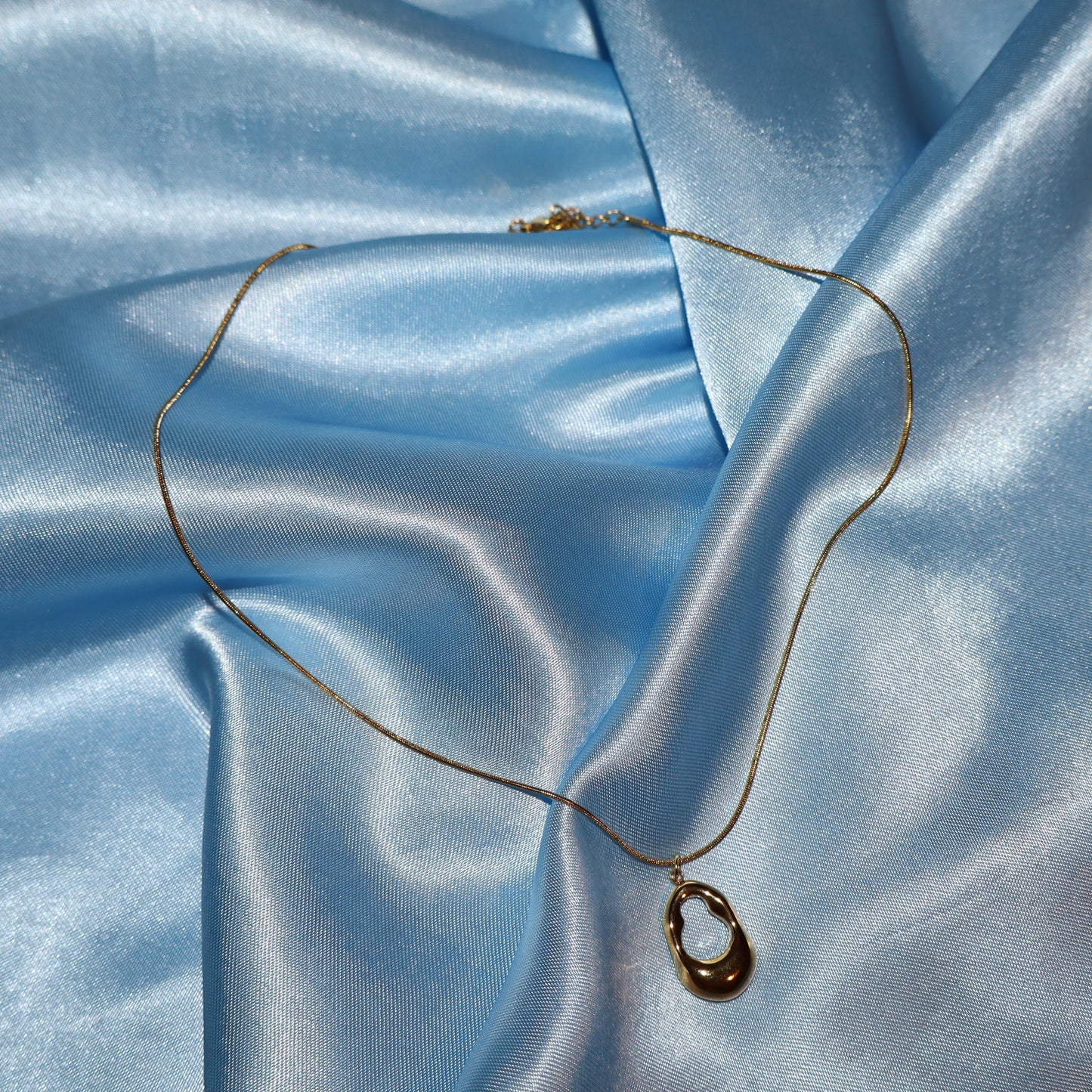 gold open oval necklace
