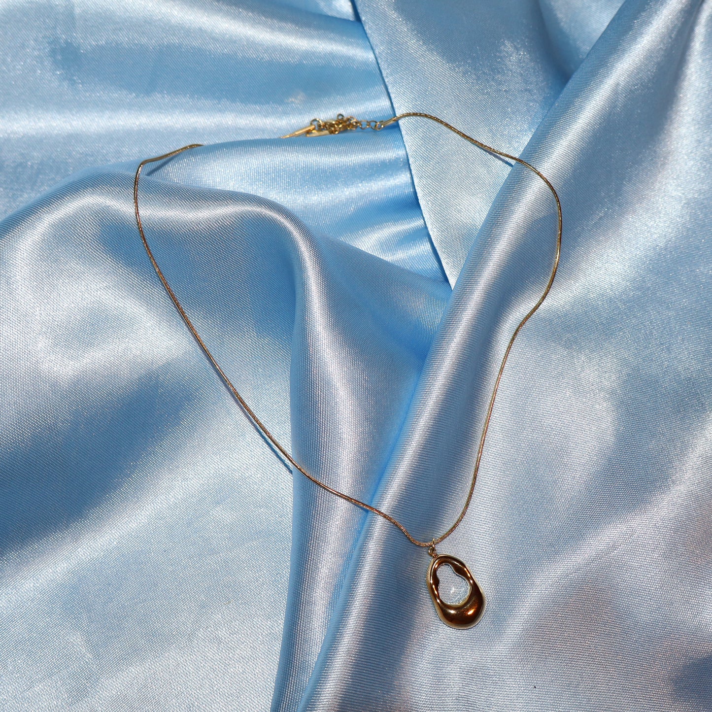 gold open oval necklace