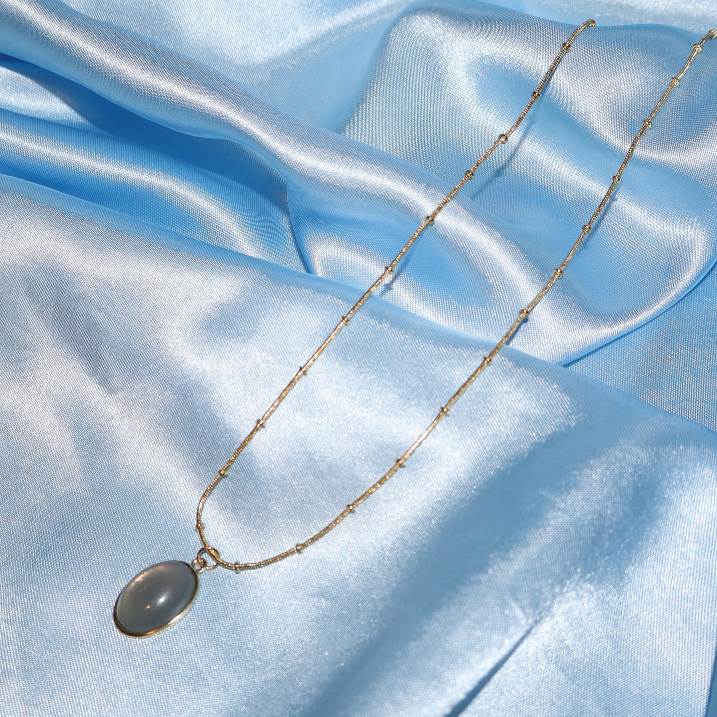 gold cadet blue pendant necklace