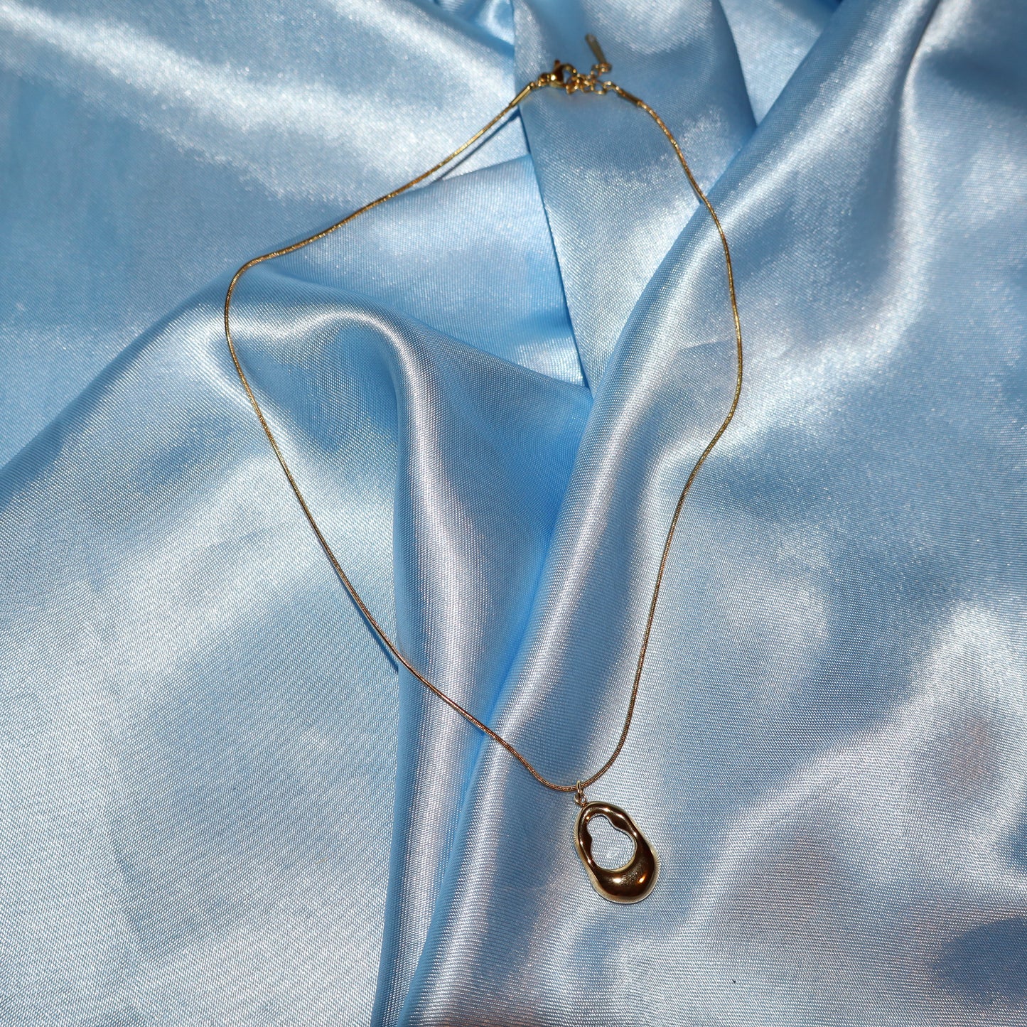 gold open oval necklace