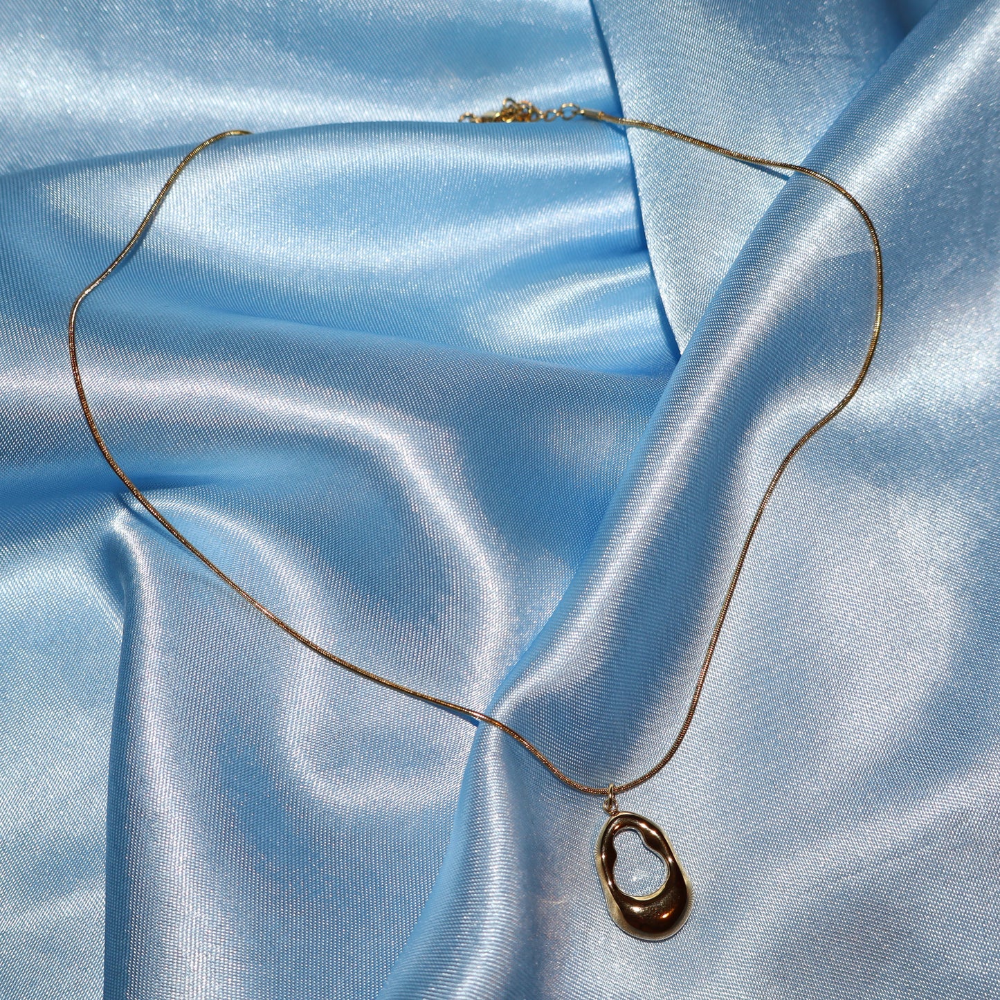gold open oval necklace