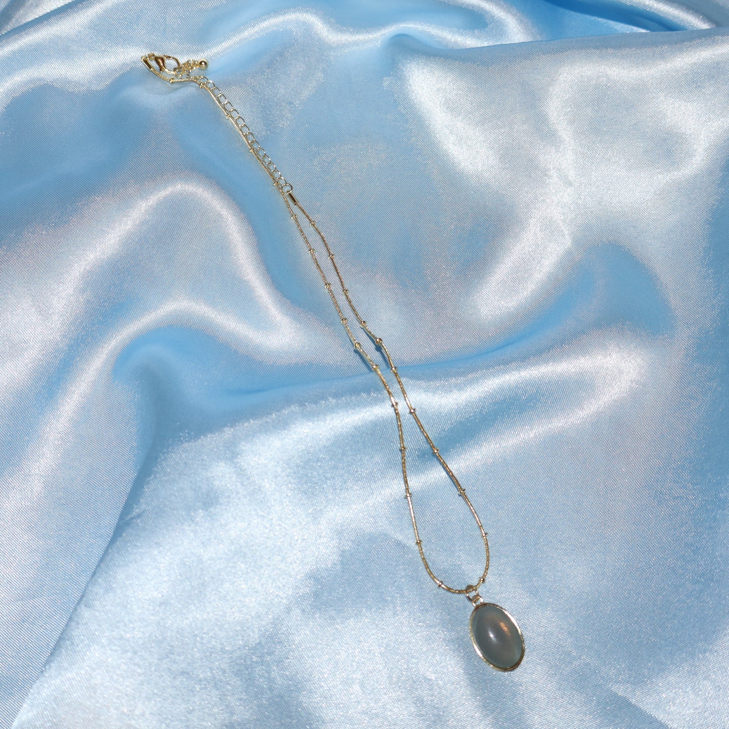 gold cadet blue pendant necklace