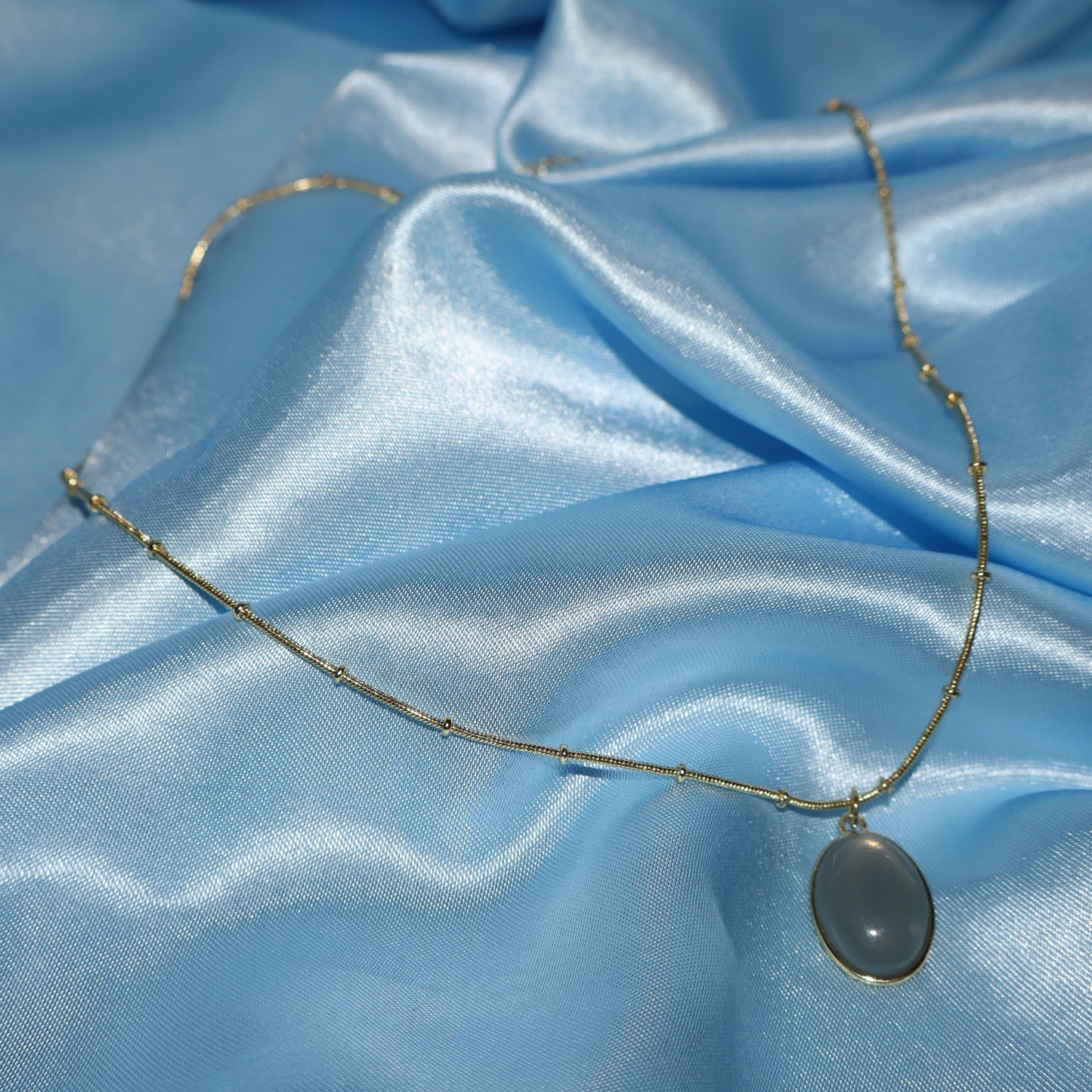gold cadet blue pendant necklace