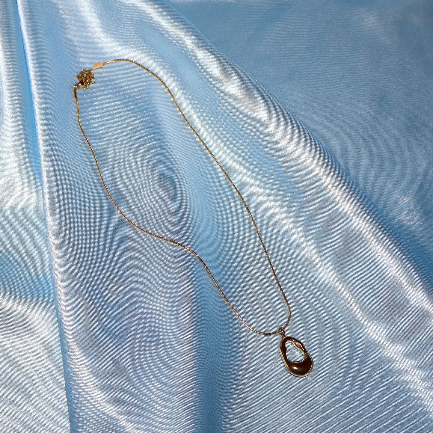 gold open oval necklace