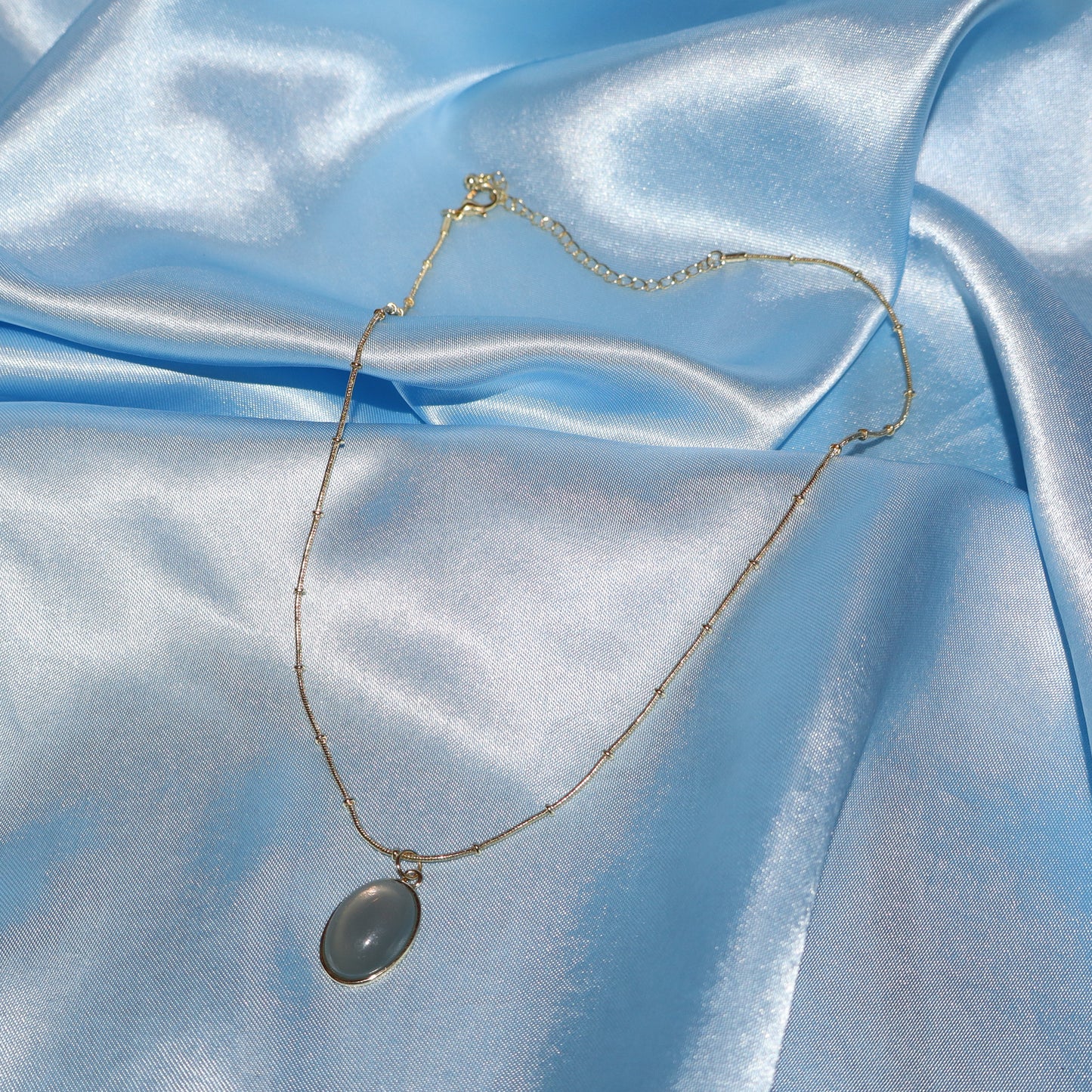 gold cadet blue pendant necklace