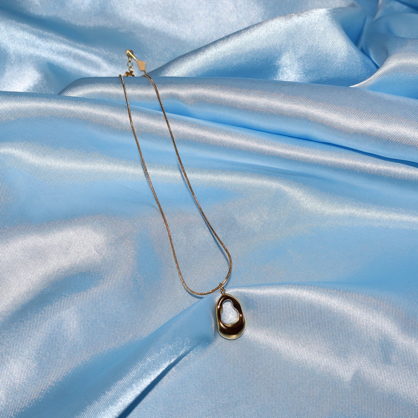 gold open oval necklace