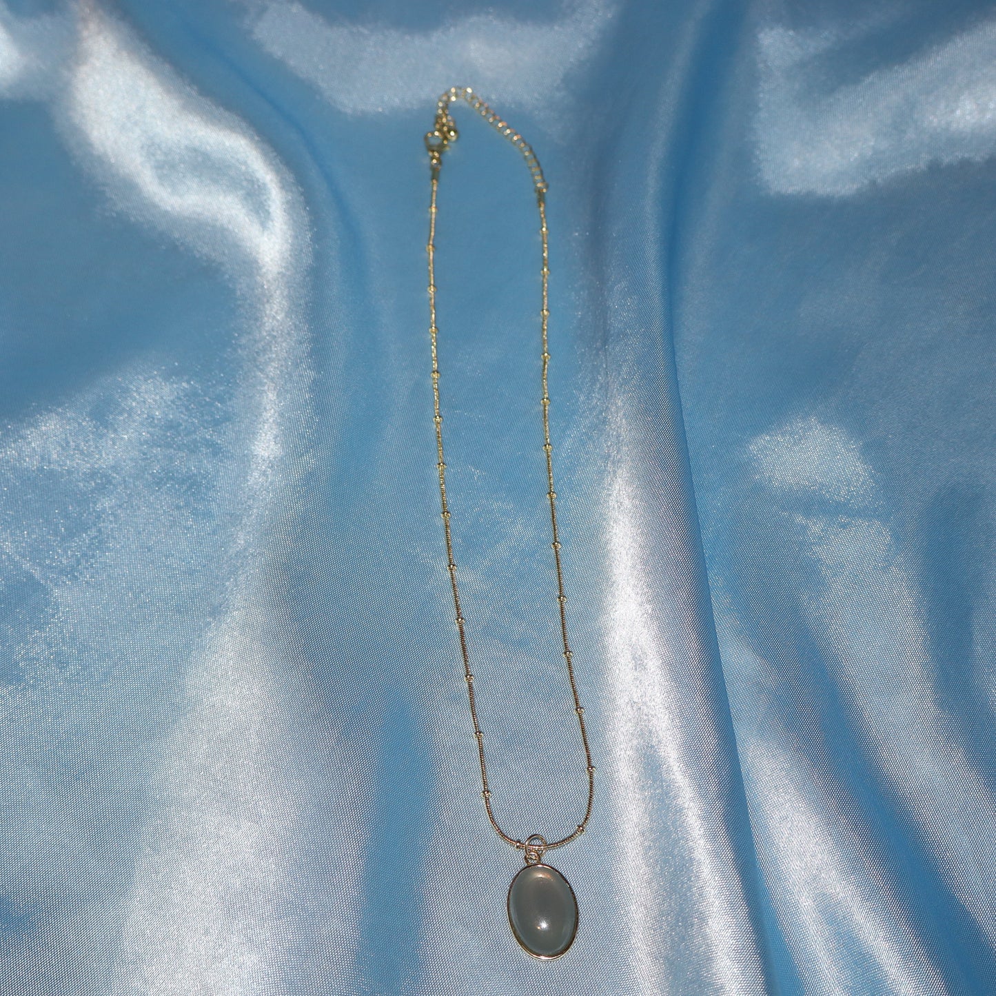 gold cadet blue pendant necklace