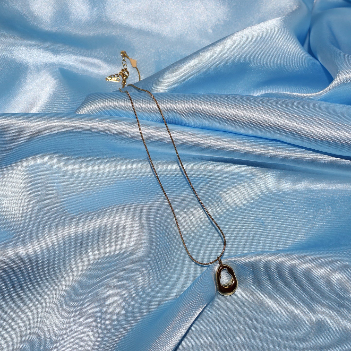 gold open oval necklace