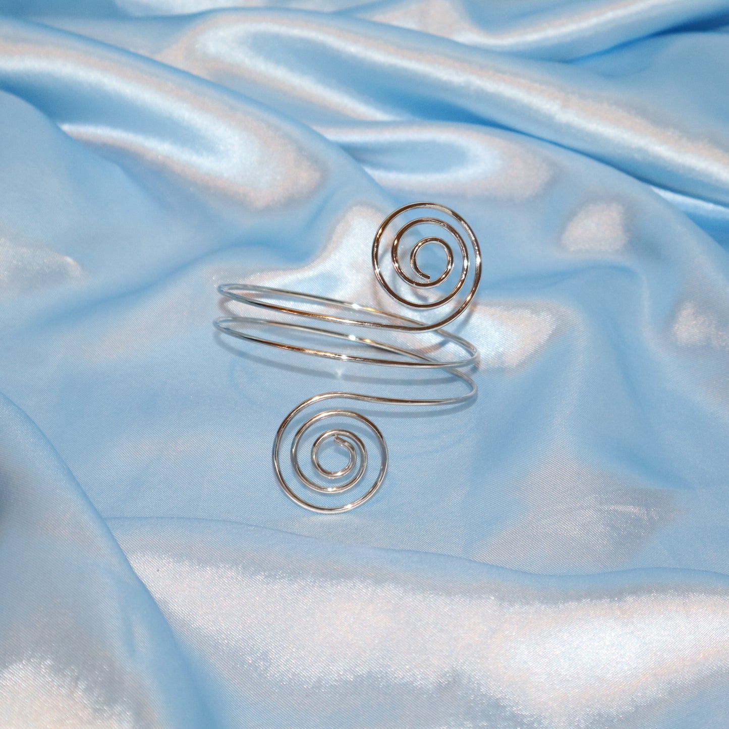 double swirl arm cuff silver