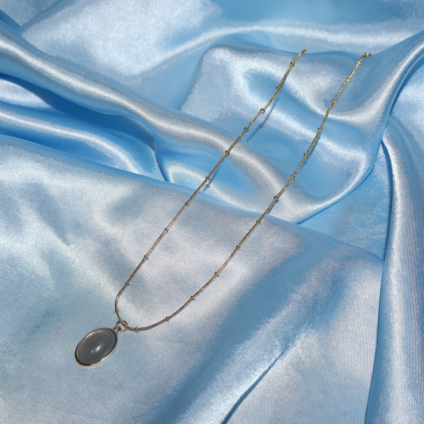 gold cadet blue pendant necklace