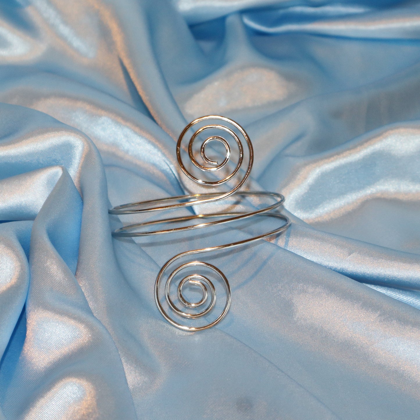 double swirl arm cuff silver