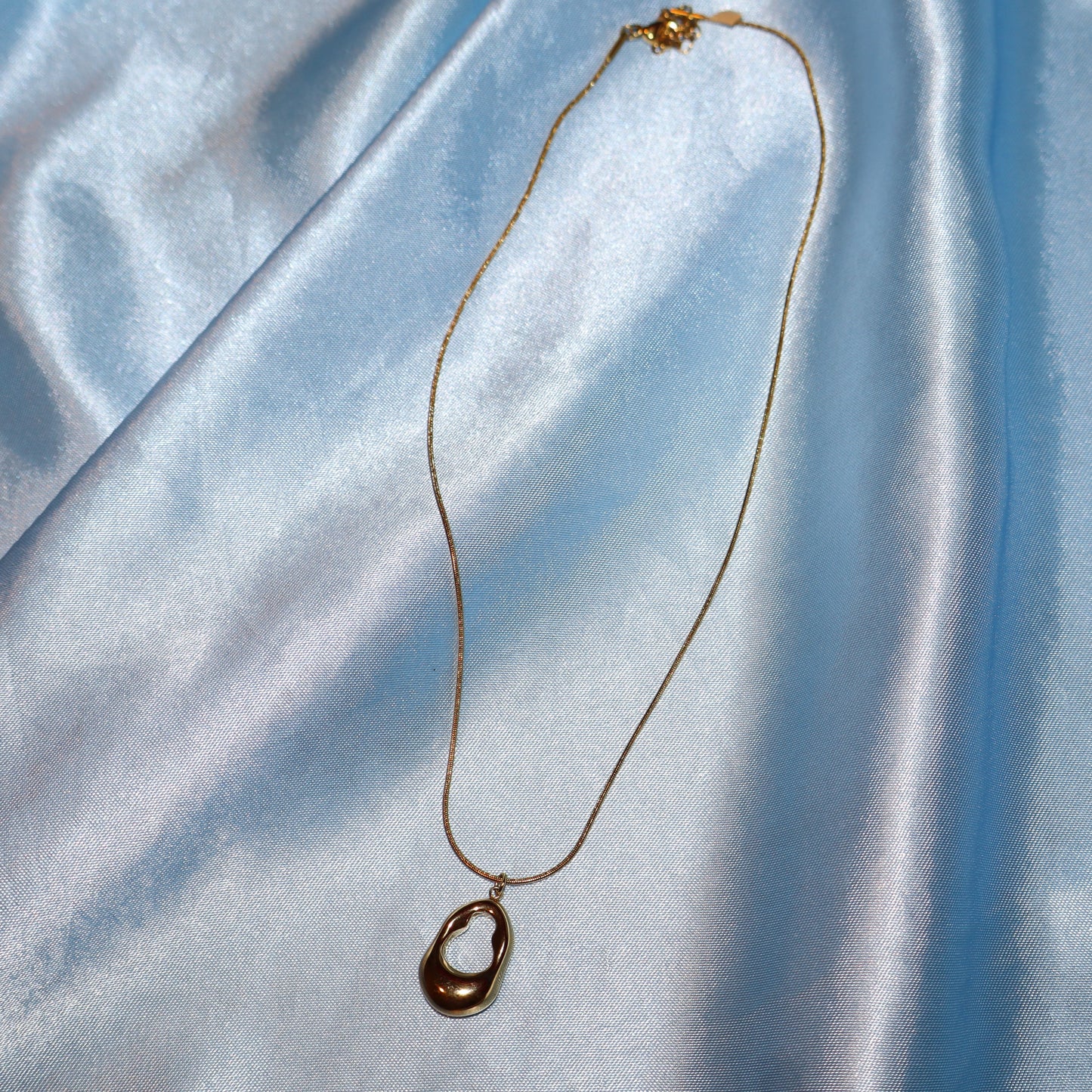 gold open oval necklace