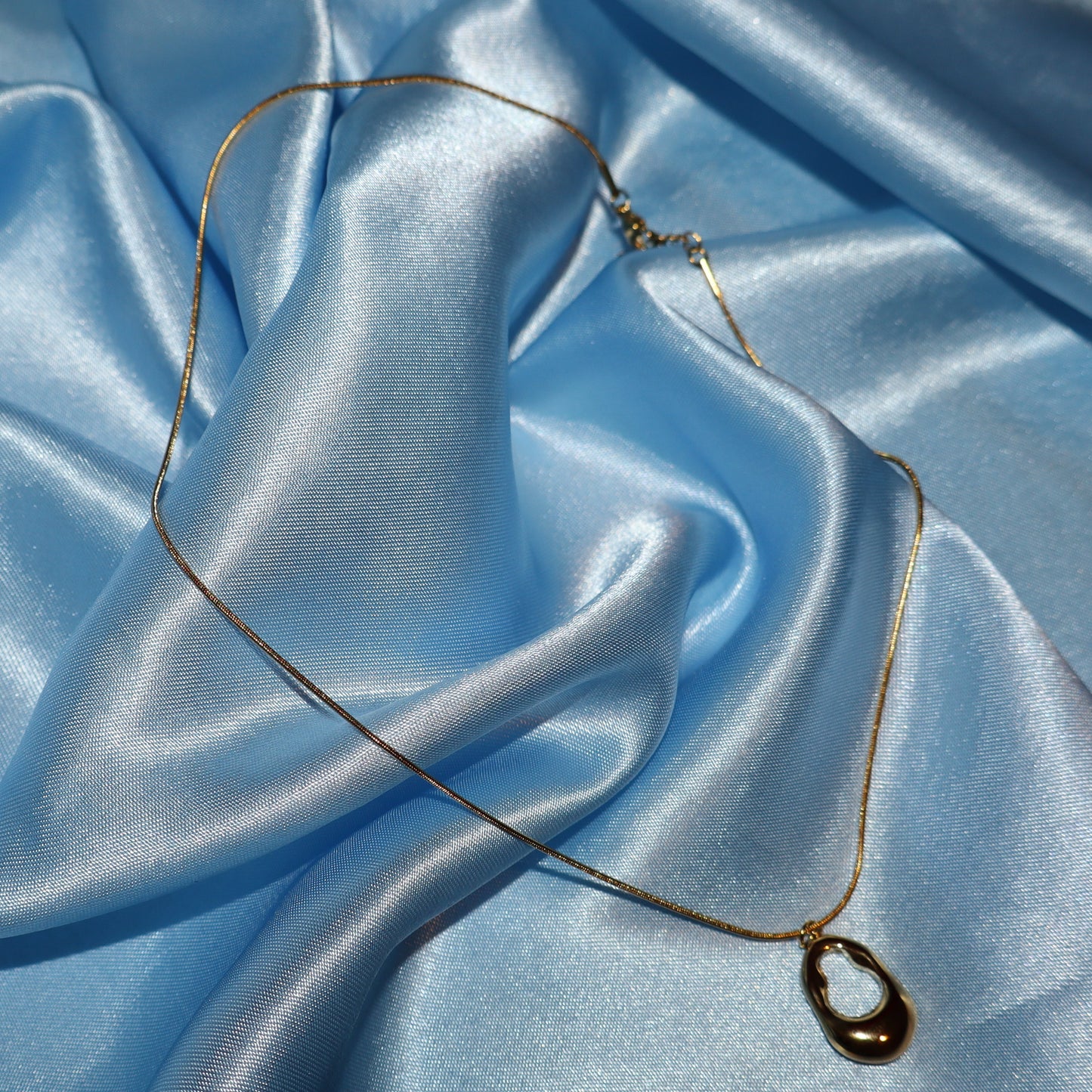 gold open oval necklace