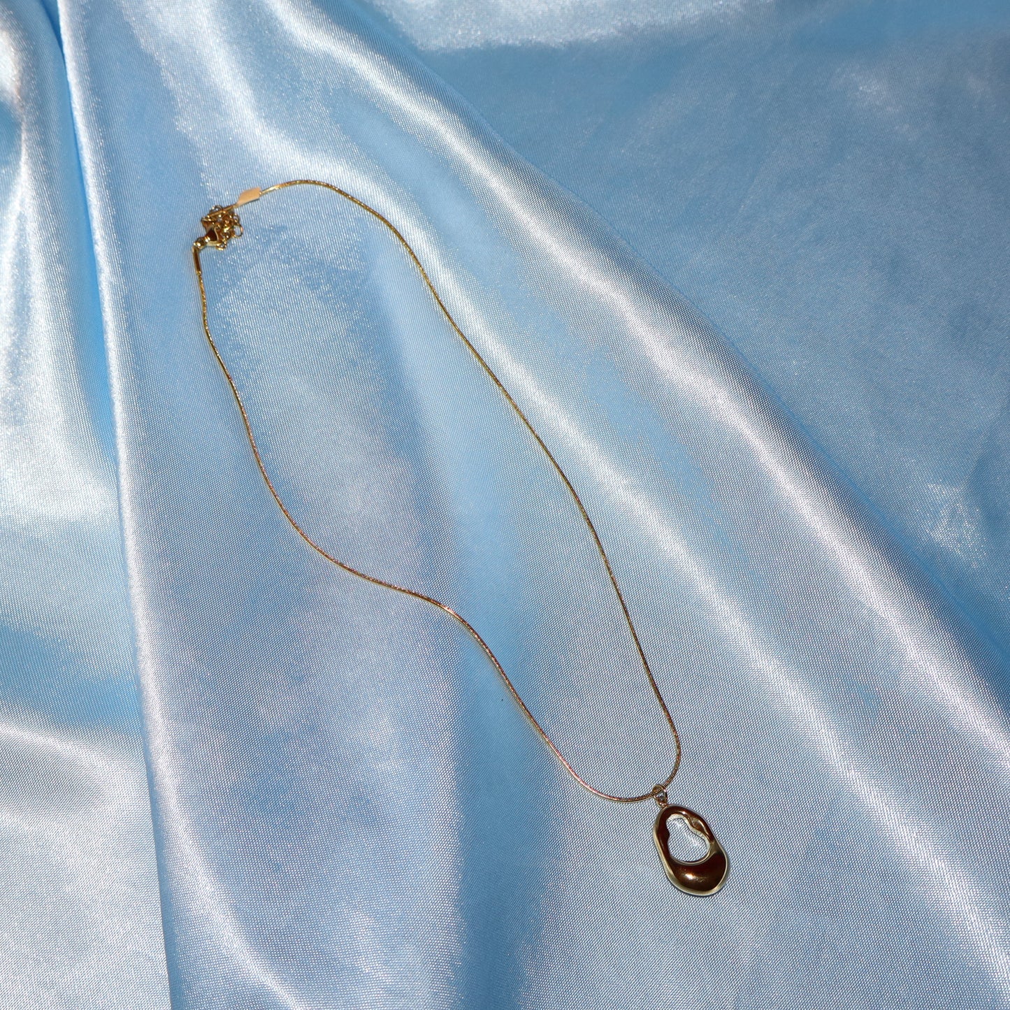 gold open oval necklace