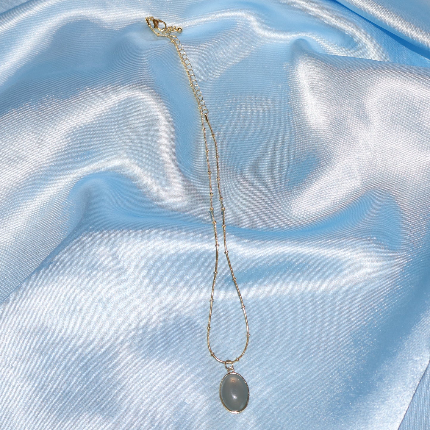 gold cadet blue pendant necklace
