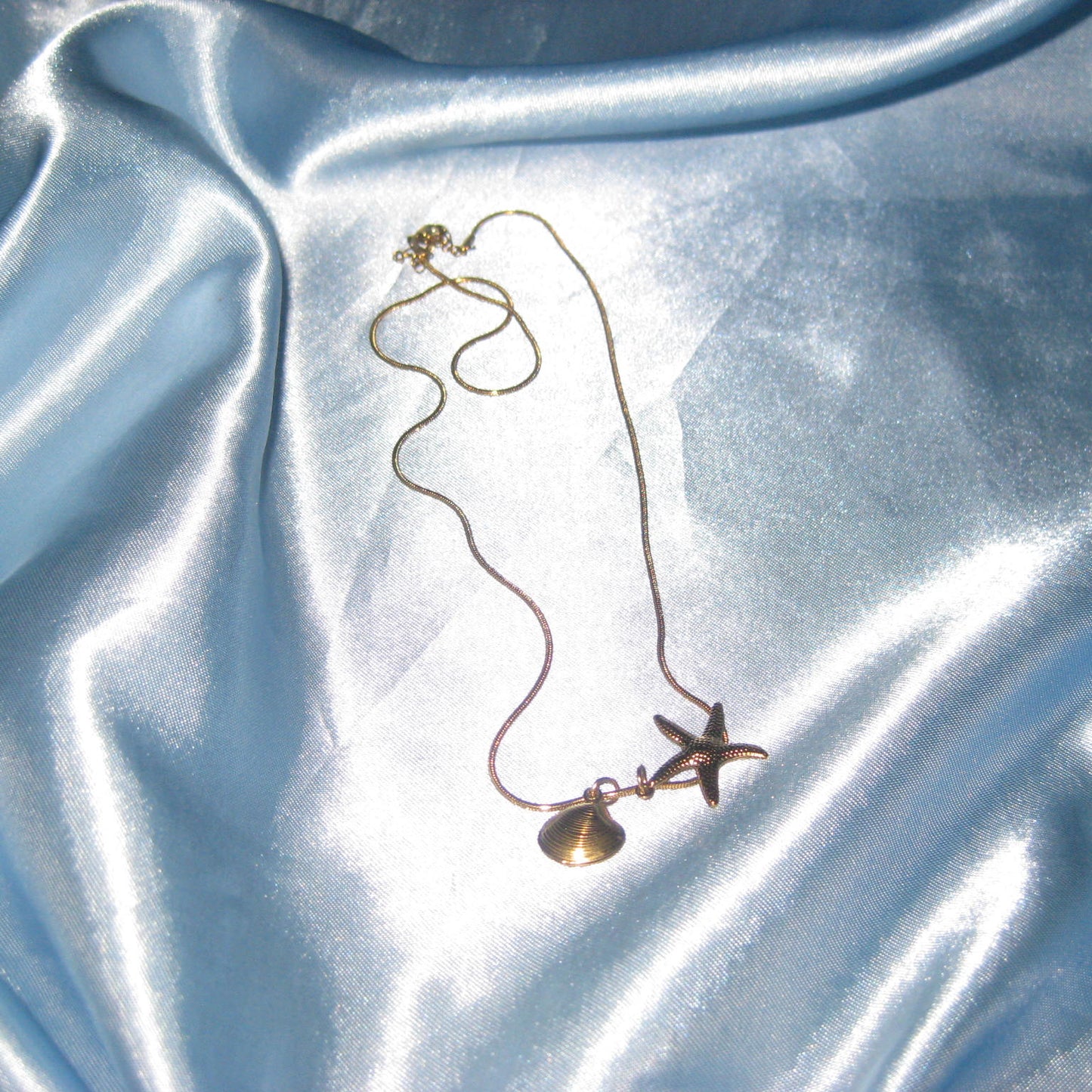 gold starfish and shell necklace