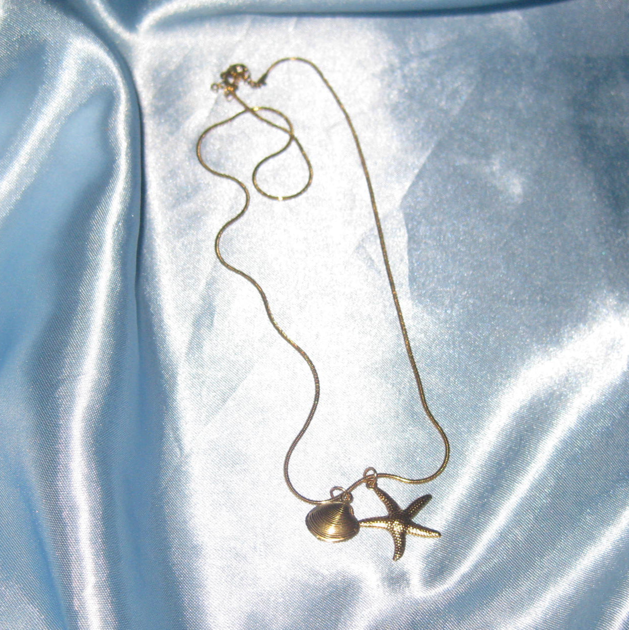 gold starfish and shell necklace