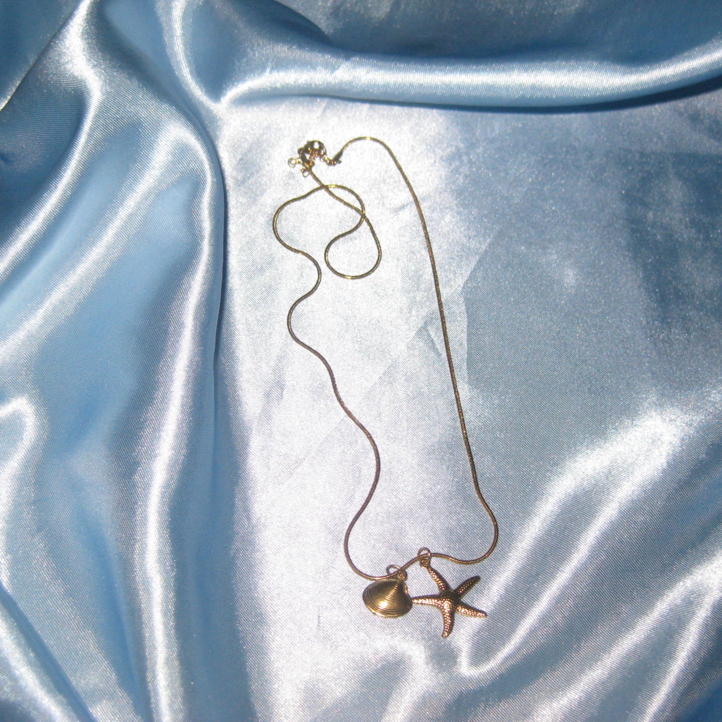 gold starfish and shell necklace