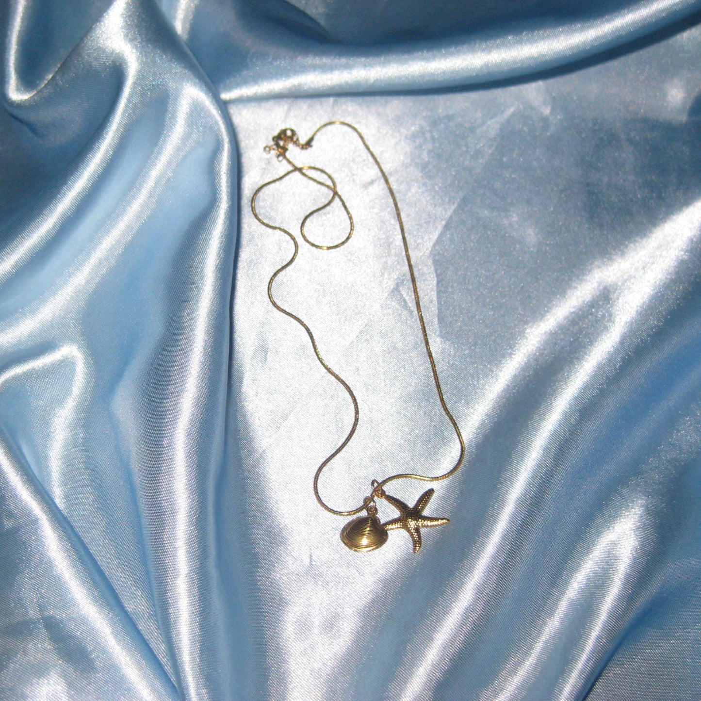 gold starfish and shell necklace