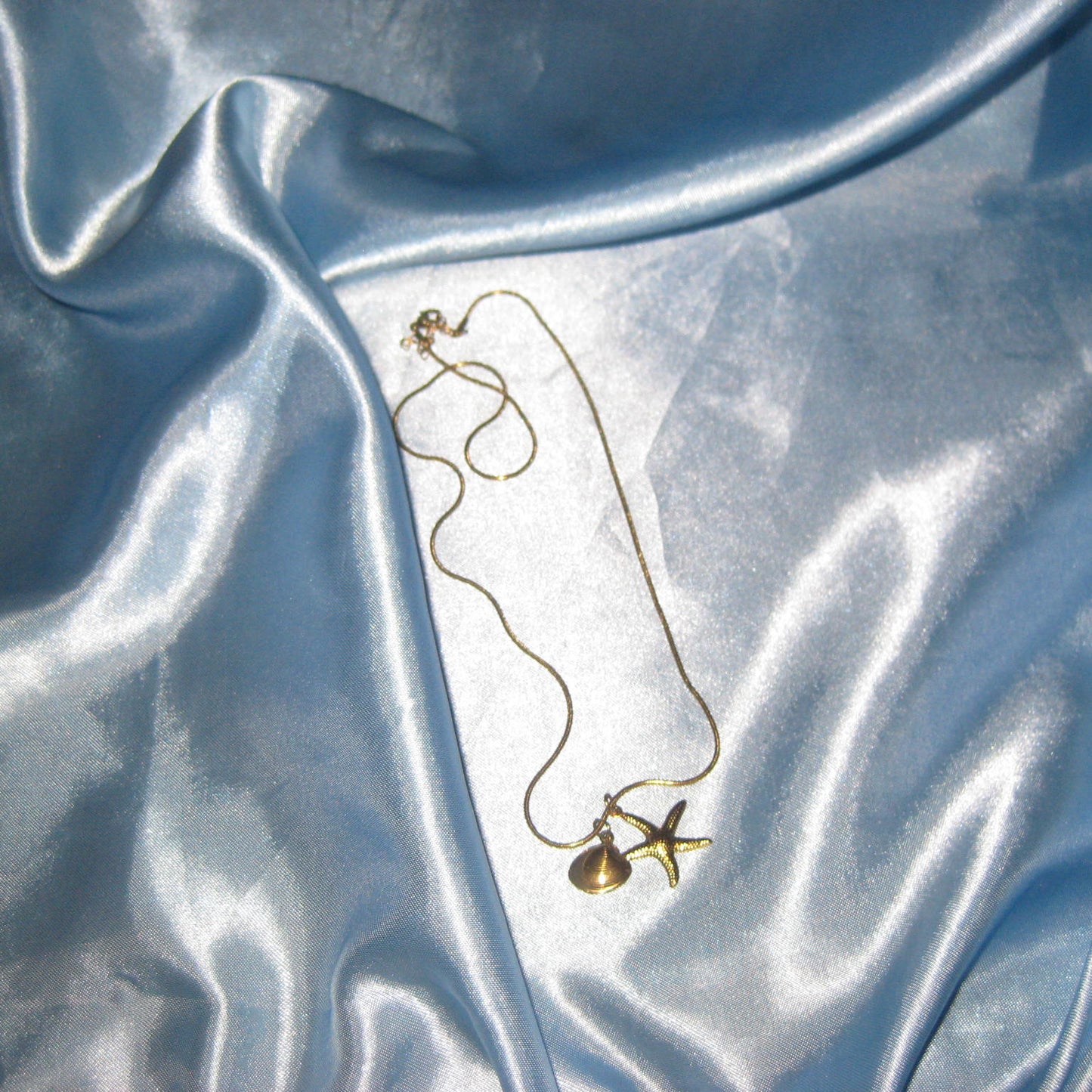 gold starfish and shell necklace