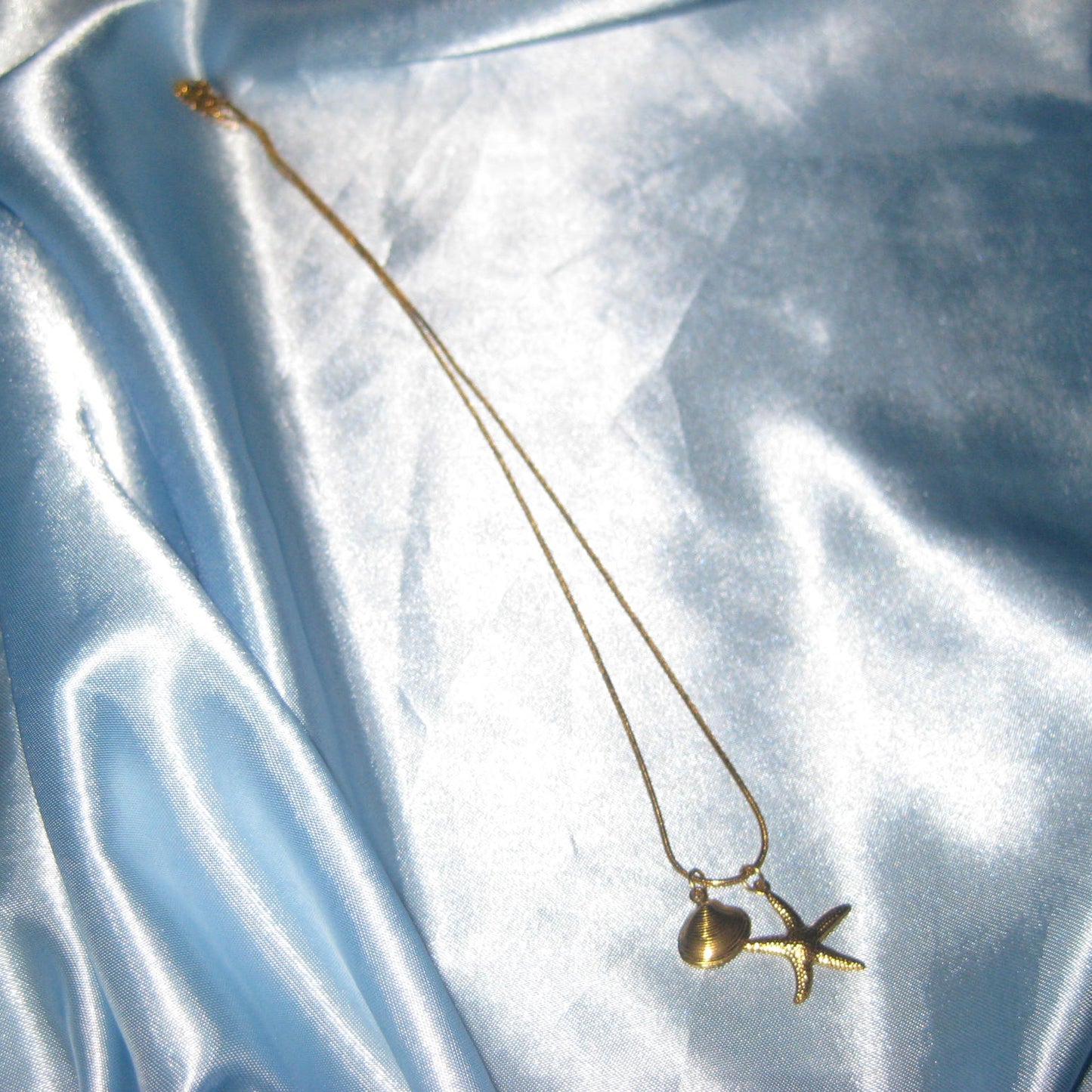 gold starfish and shell necklace