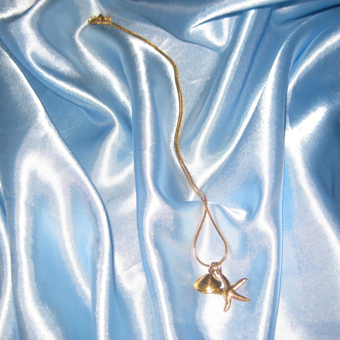 gold starfish and shell necklace