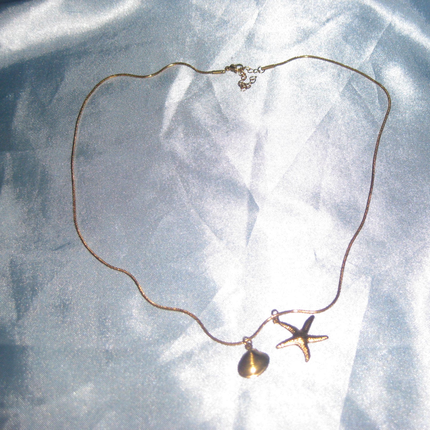 gold starfish and shell necklace