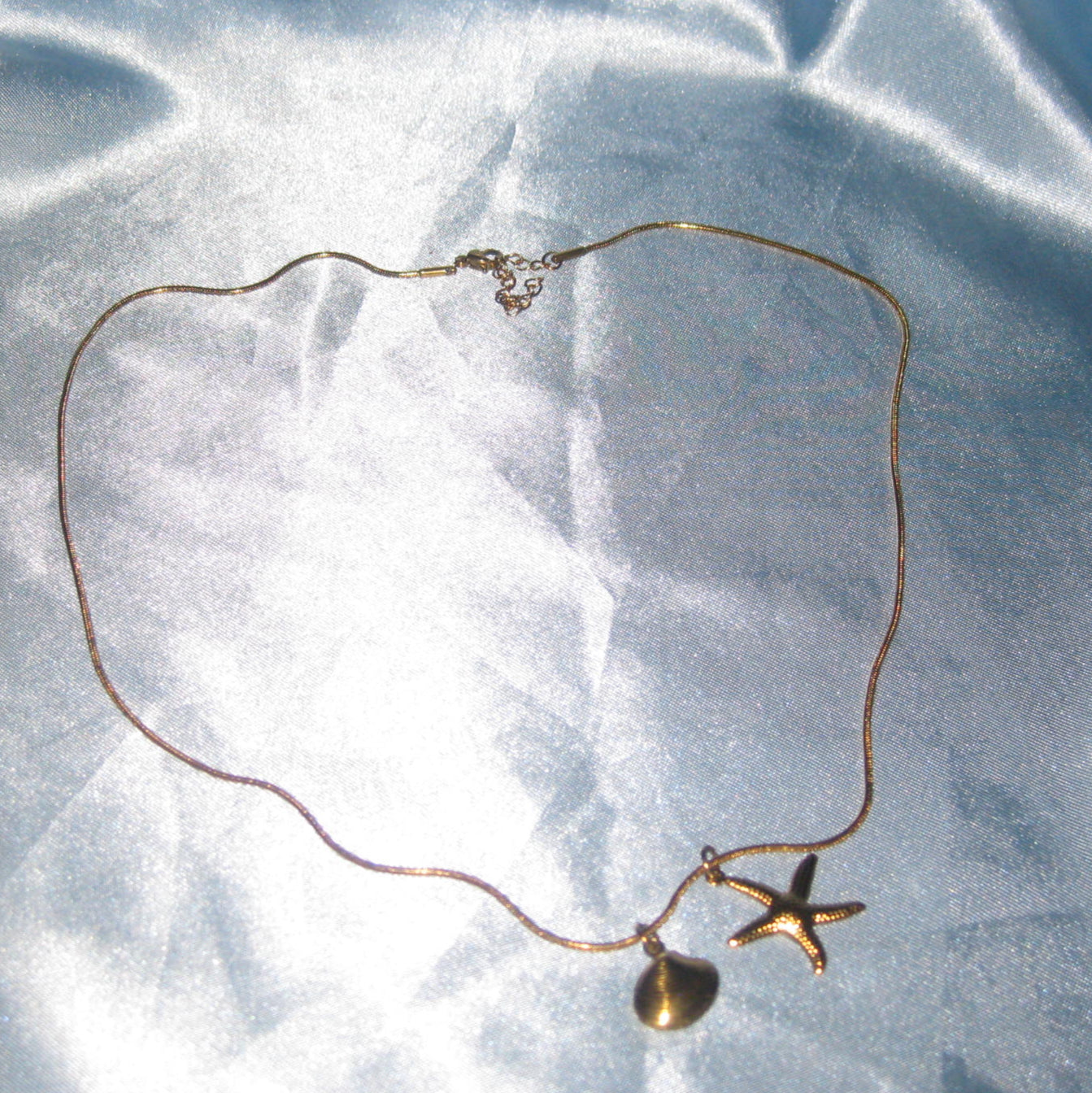 gold starfish and shell necklace