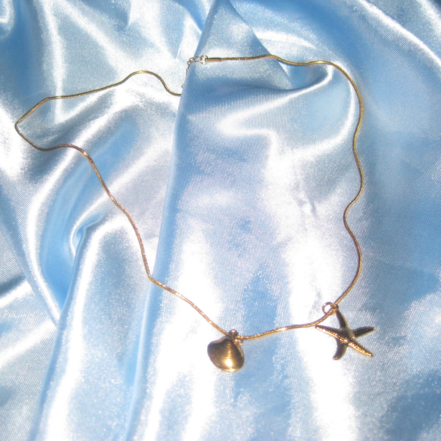 gold starfish and shell necklace