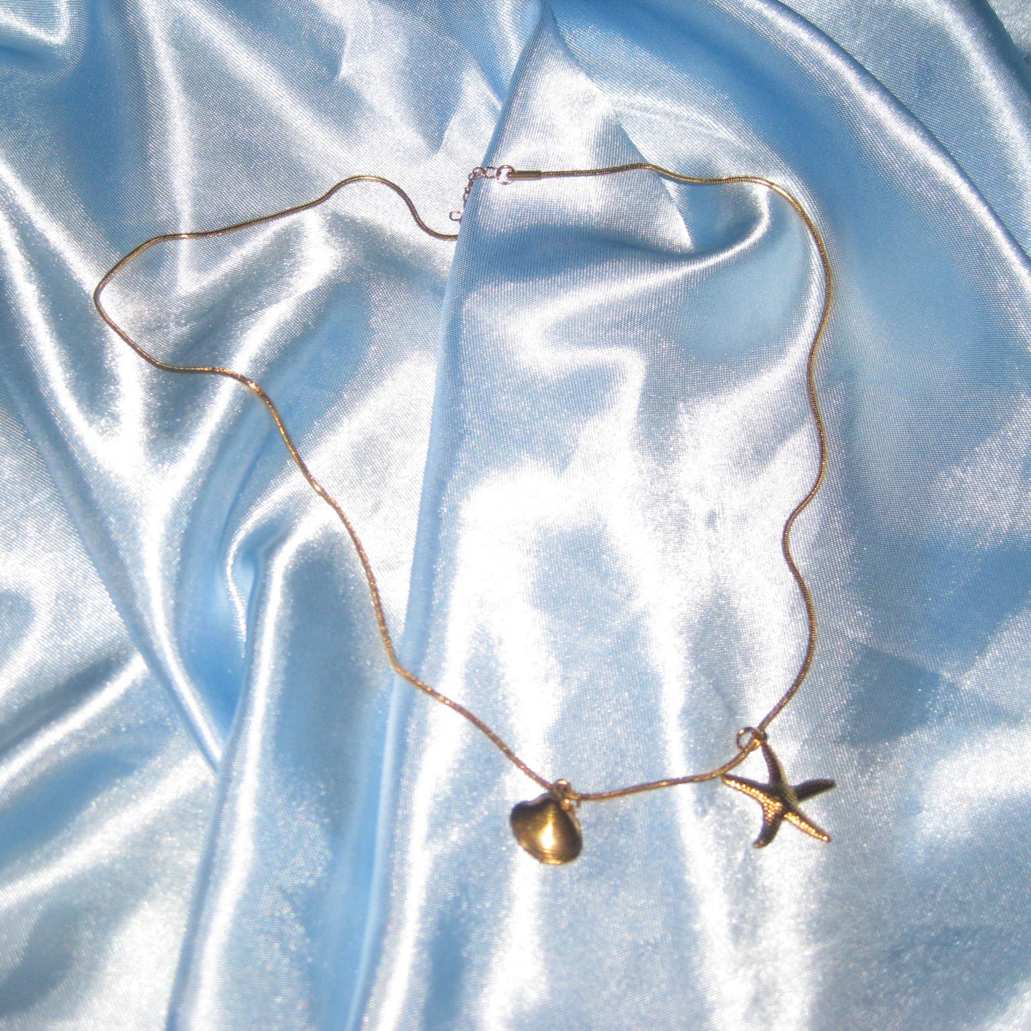 gold starfish and shell necklace