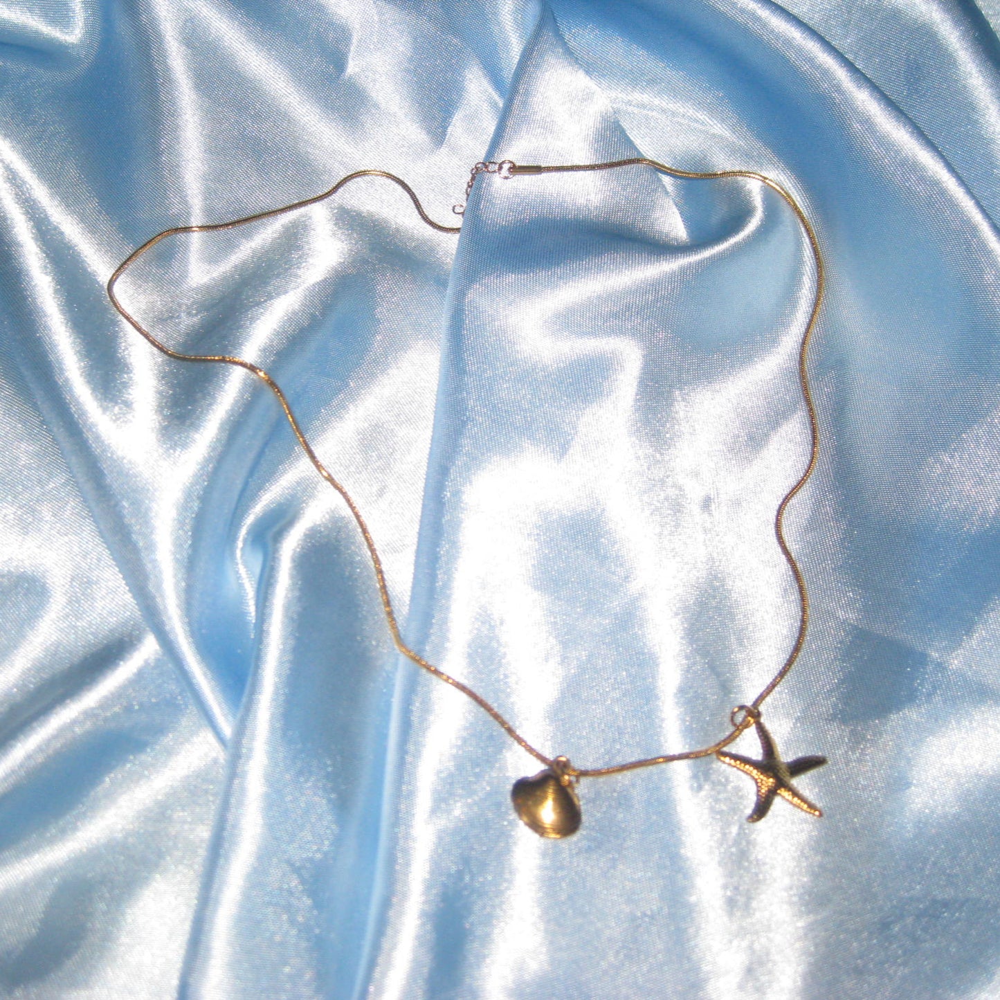 gold starfish and shell necklace