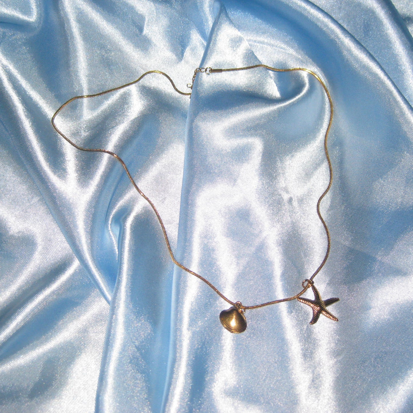 gold starfish and shell necklace