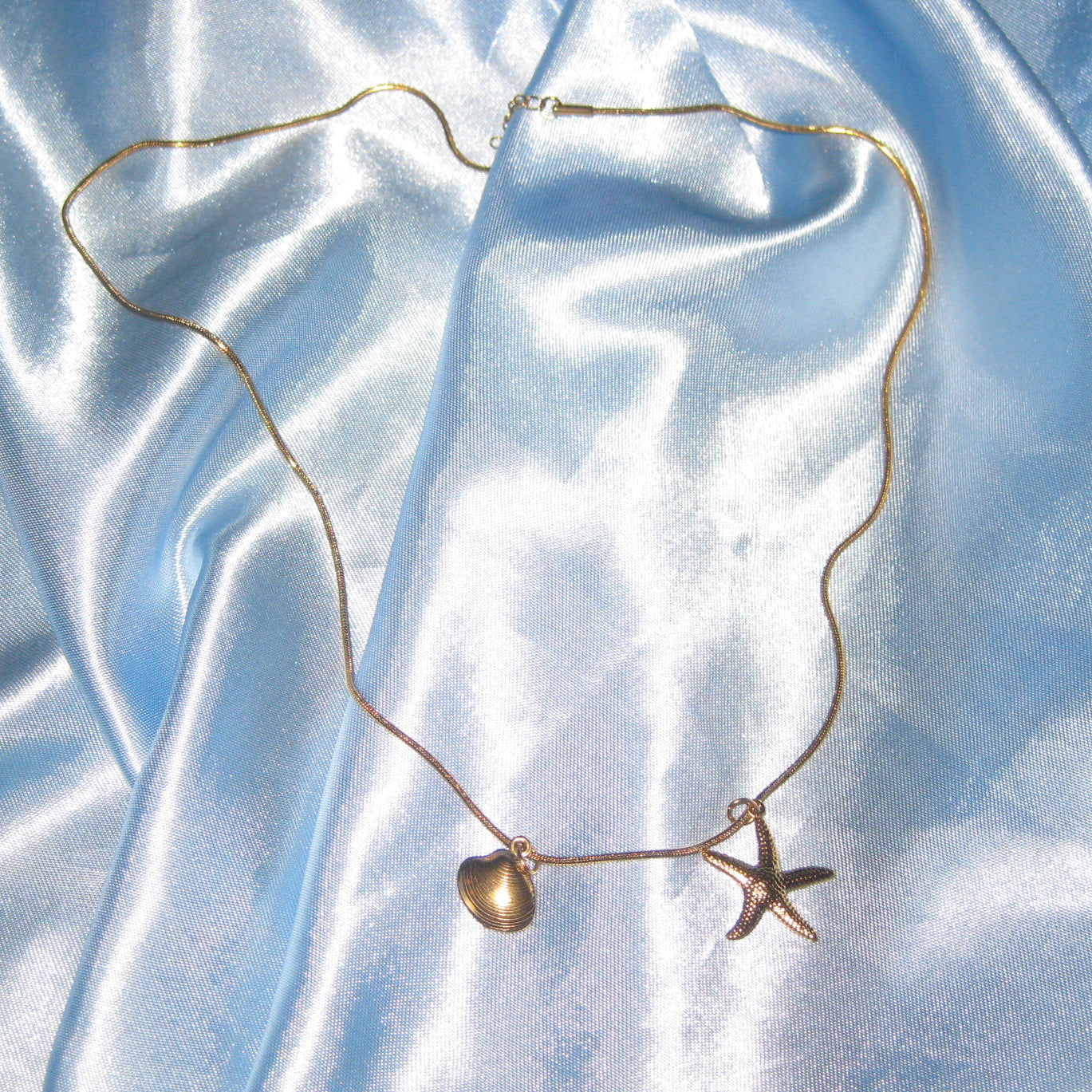 gold starfish and shell necklace