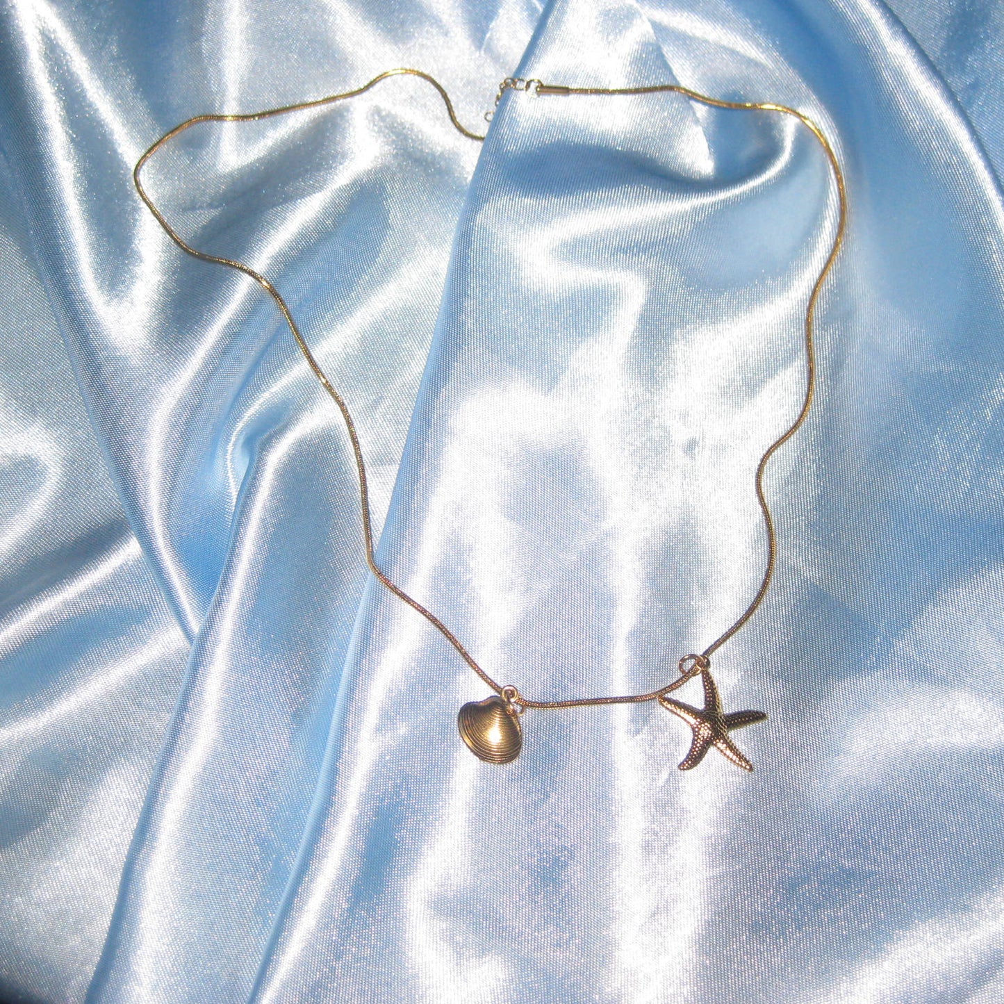 gold starfish and shell necklace