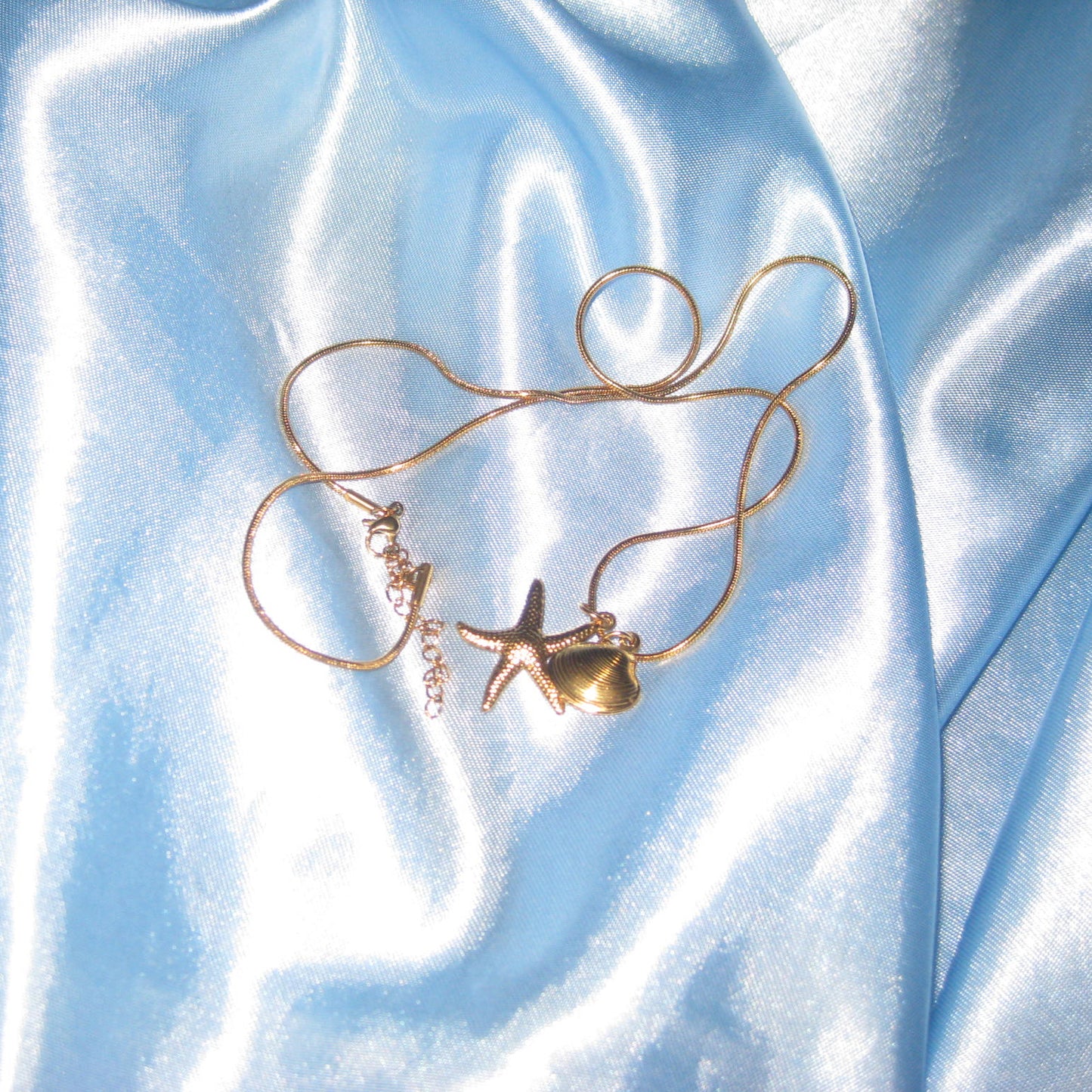 gold starfish and shell necklace