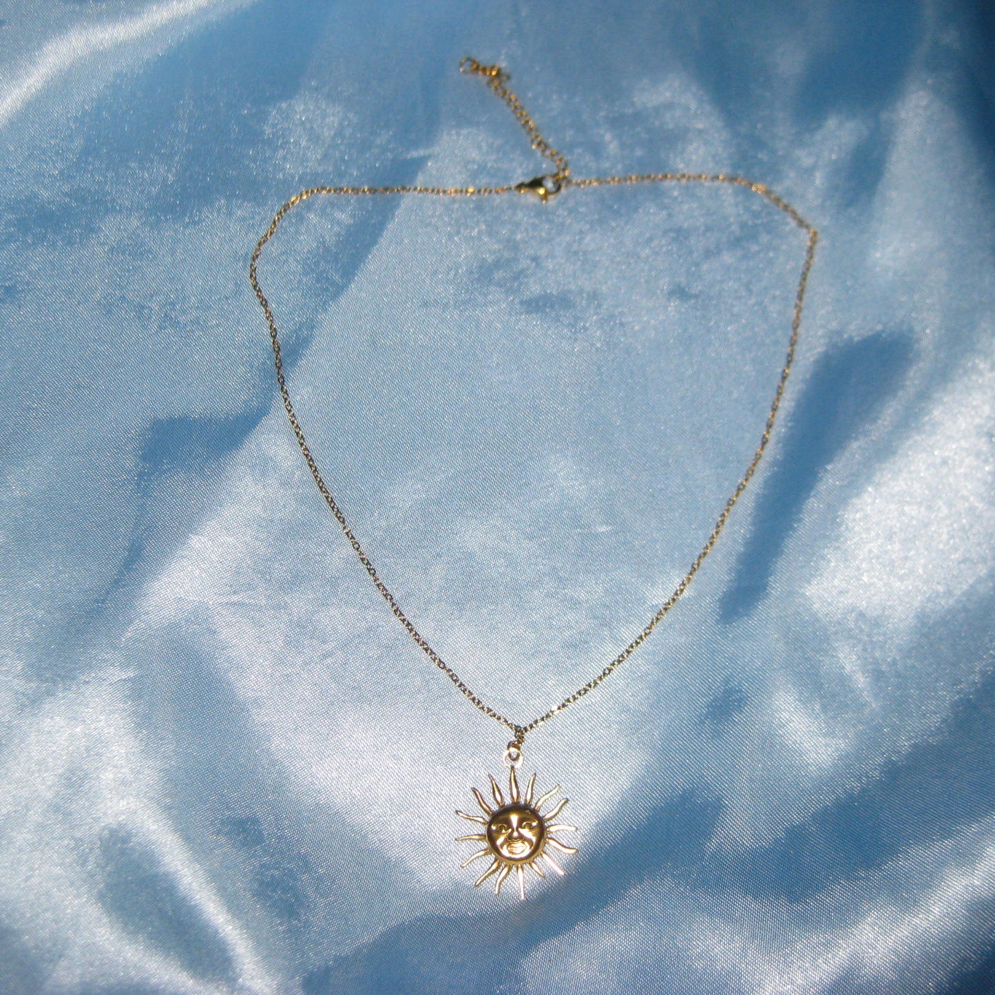 golden sun necklace