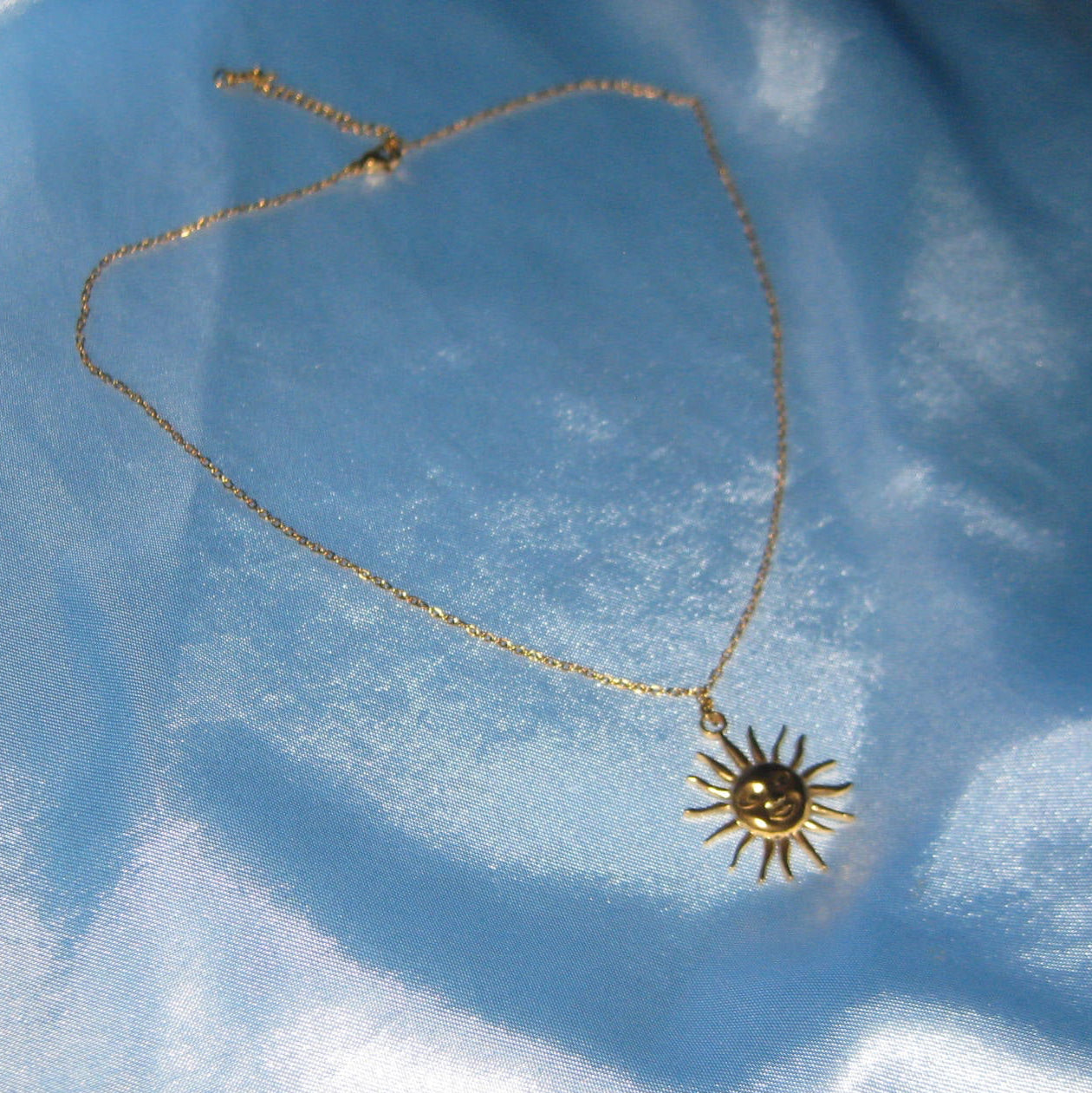 golden sun necklace