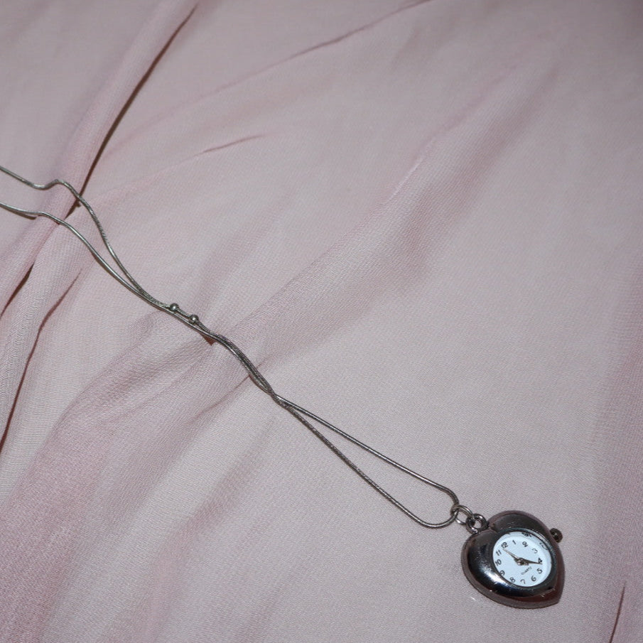 silver heart shaped watch necklace