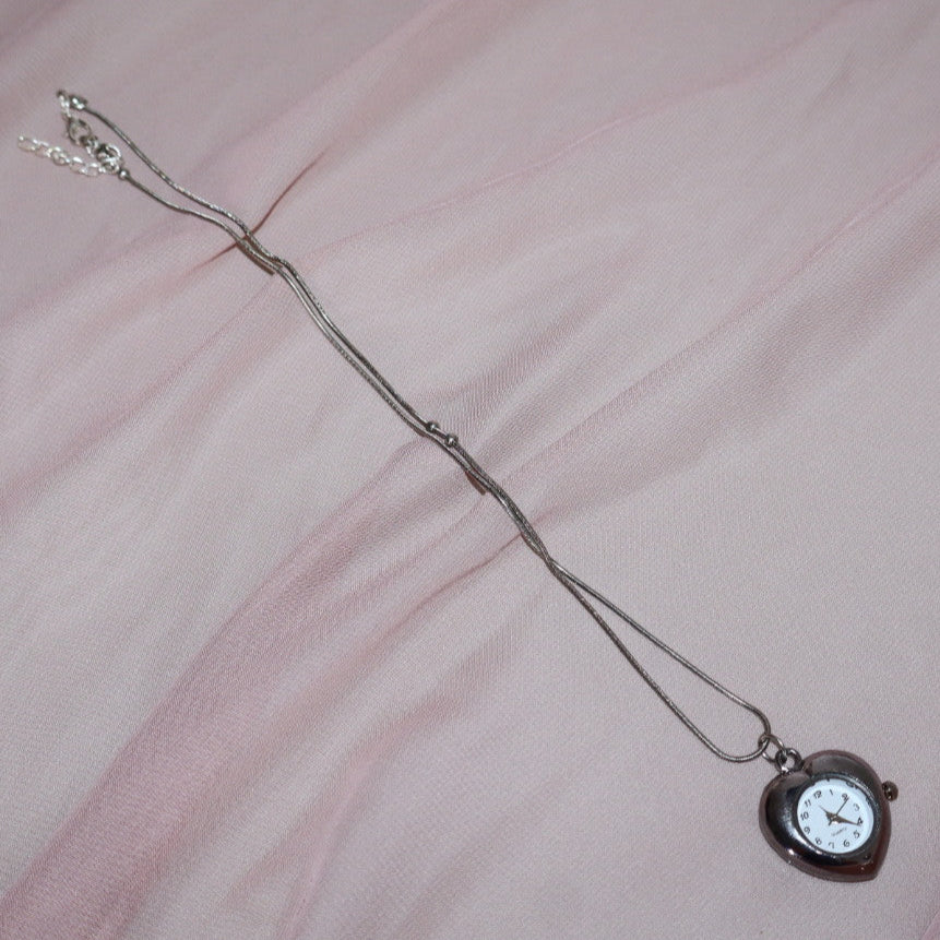 silver heart shaped watch necklace