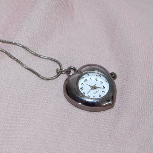 silver heart shaped watch necklace