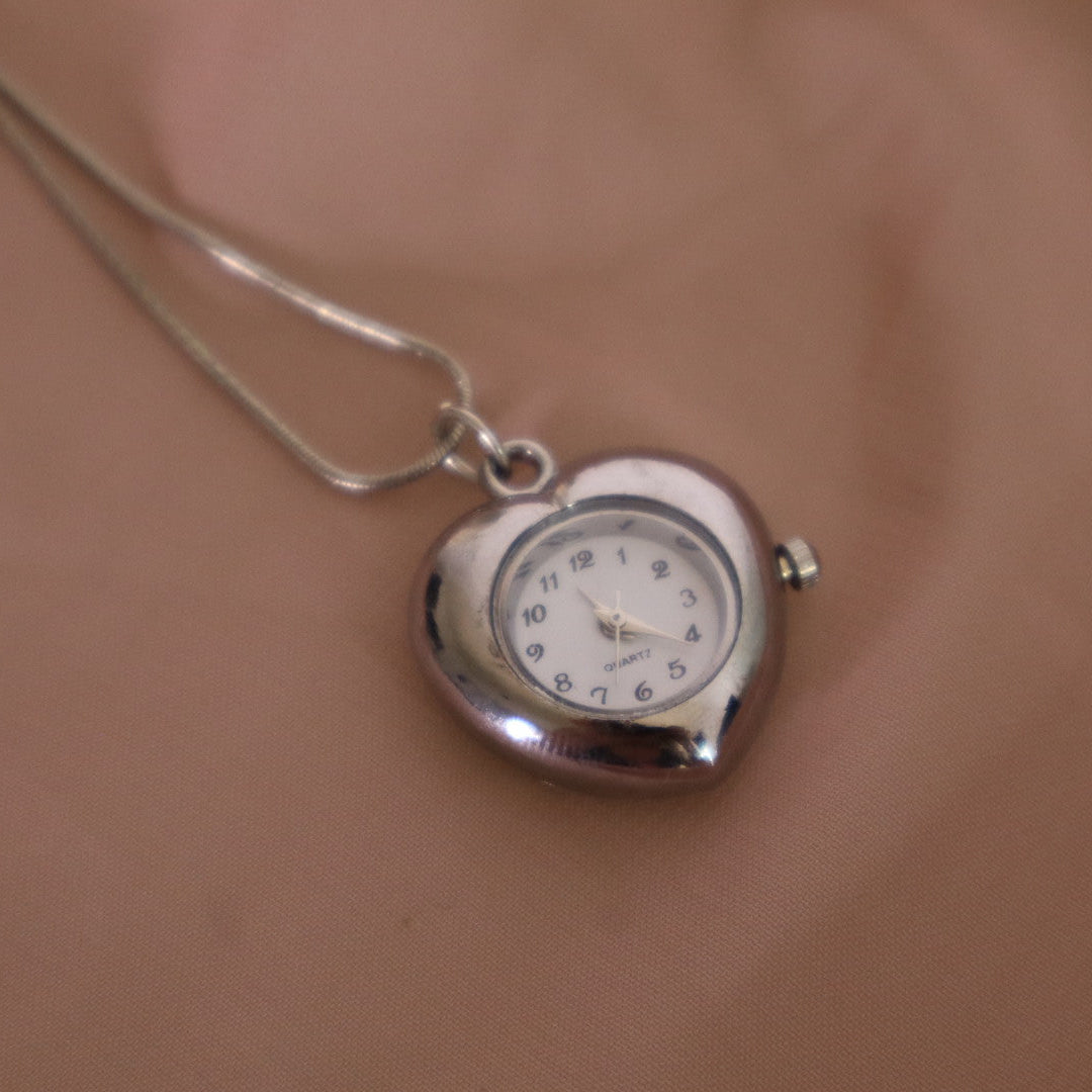 silver heart shaped watch necklace