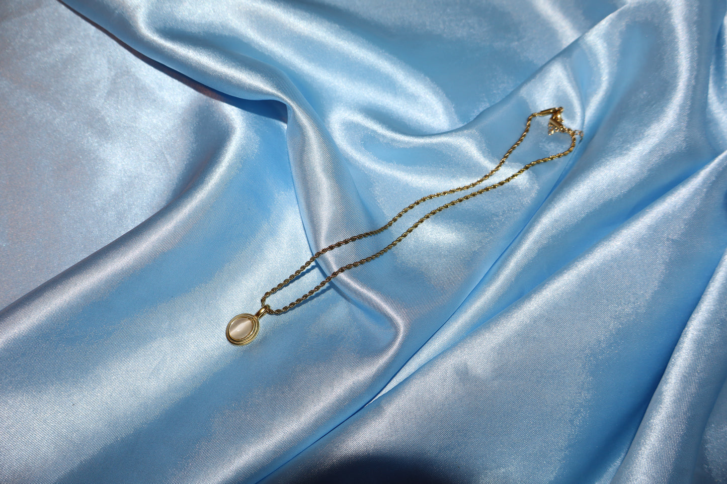 white stone pendant gold necklace