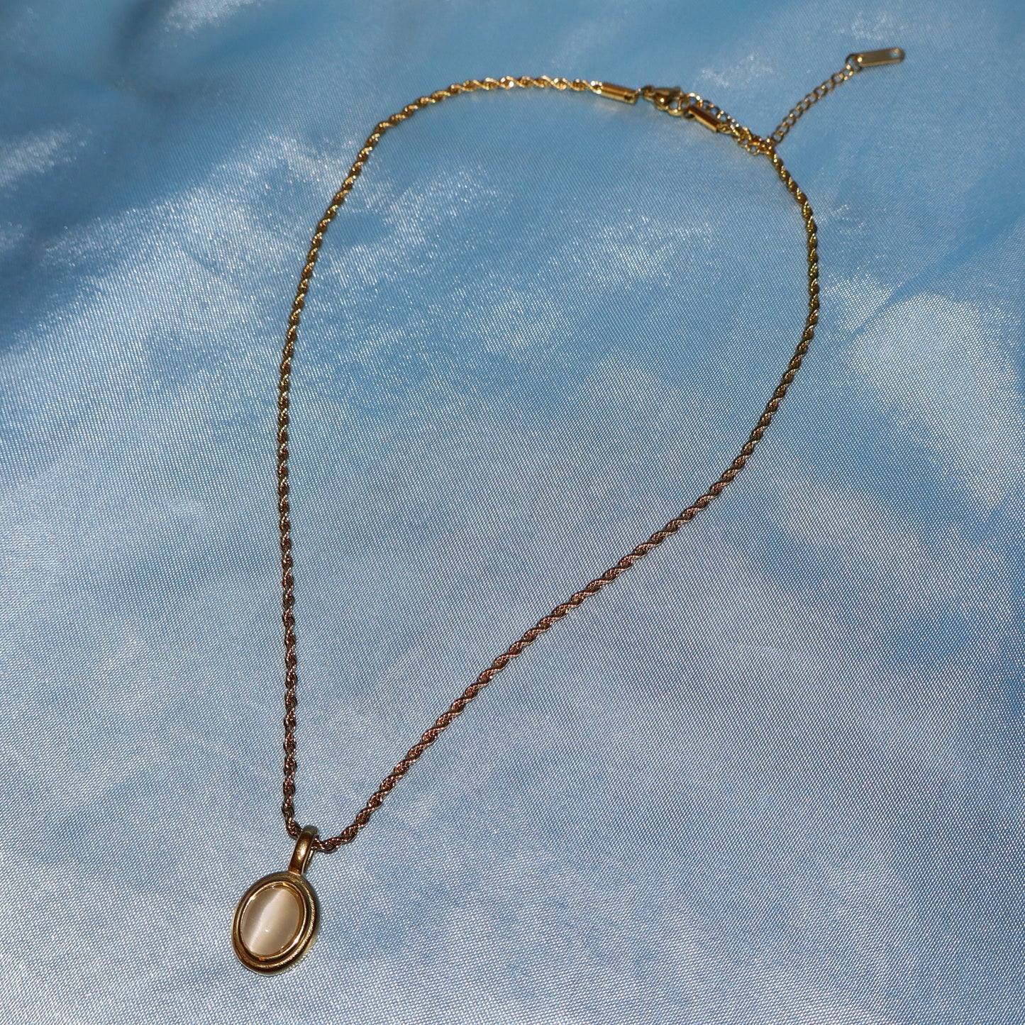 white stone pendant gold necklace