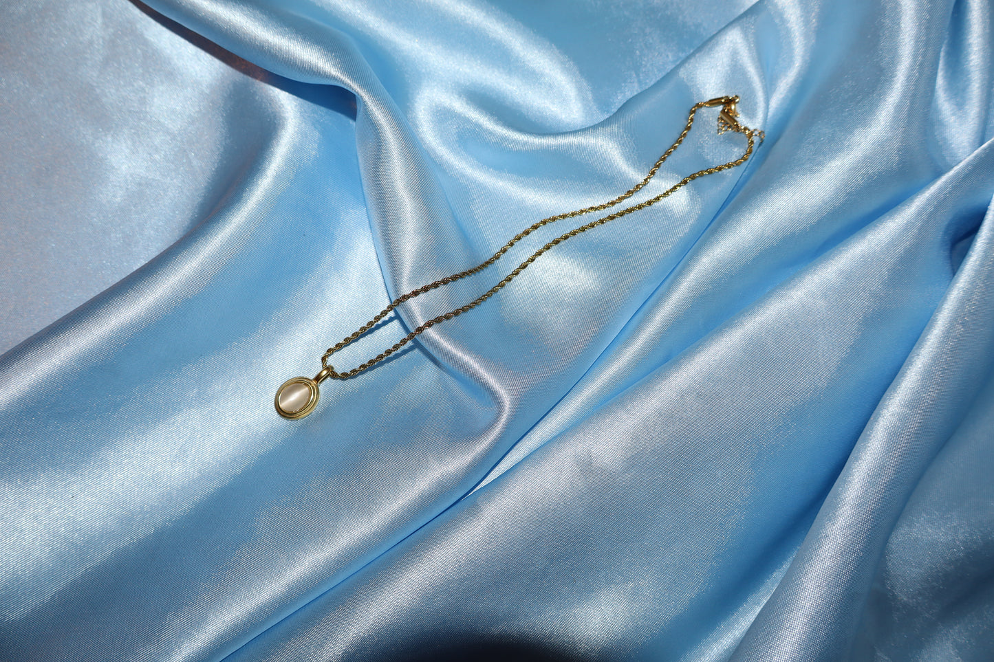 white stone pendant gold necklace