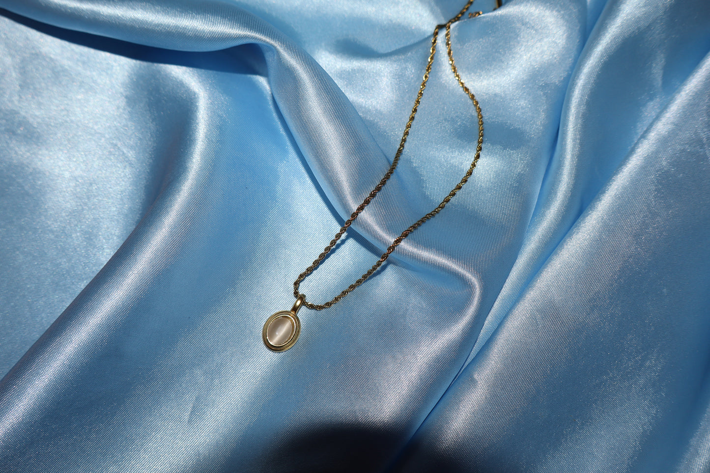 white stone pendant gold necklace