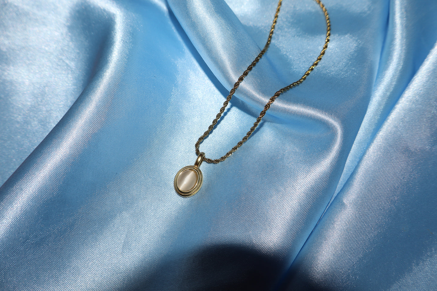 white stone pendant gold necklace