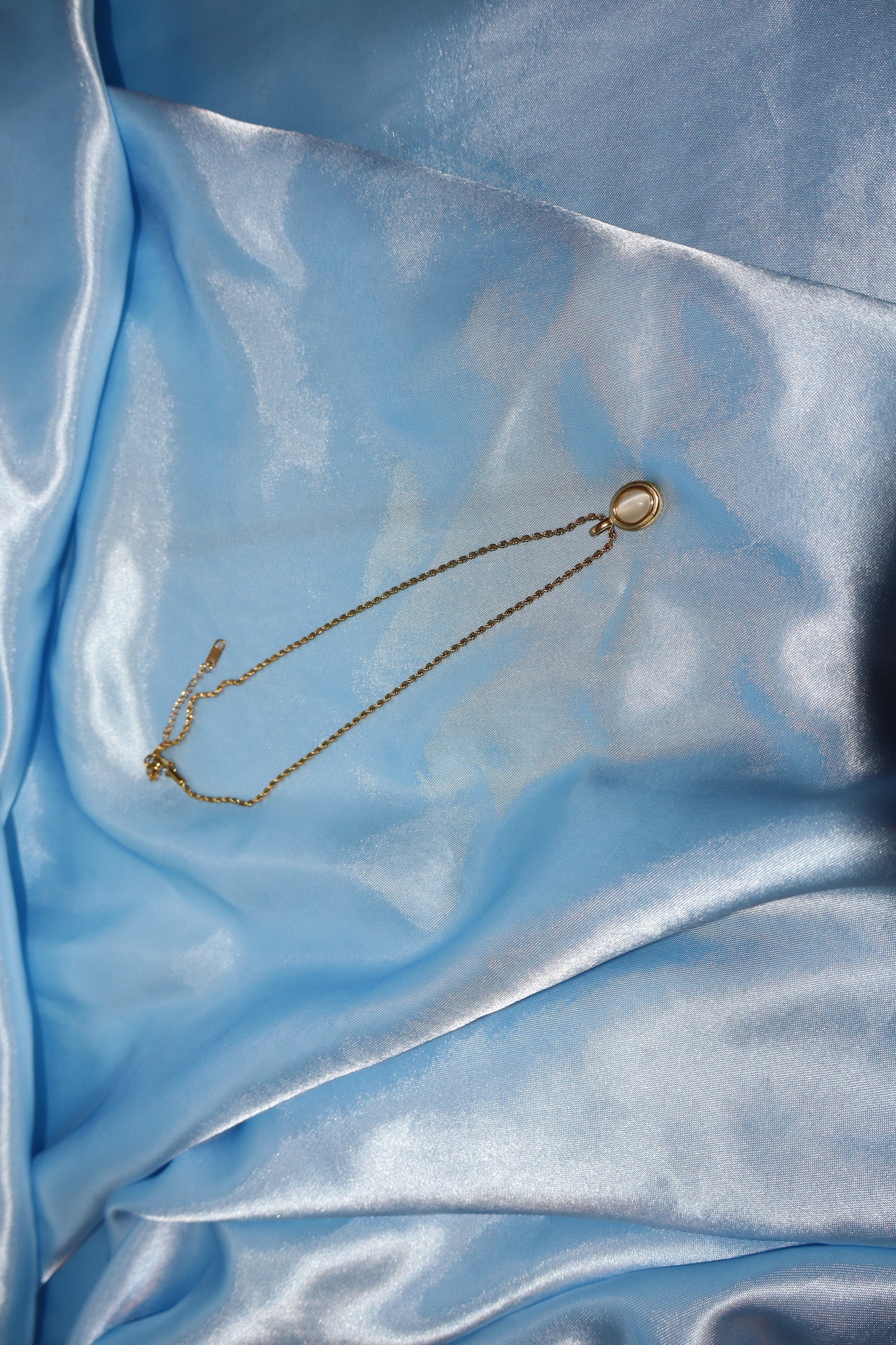 white stone pendant gold necklace