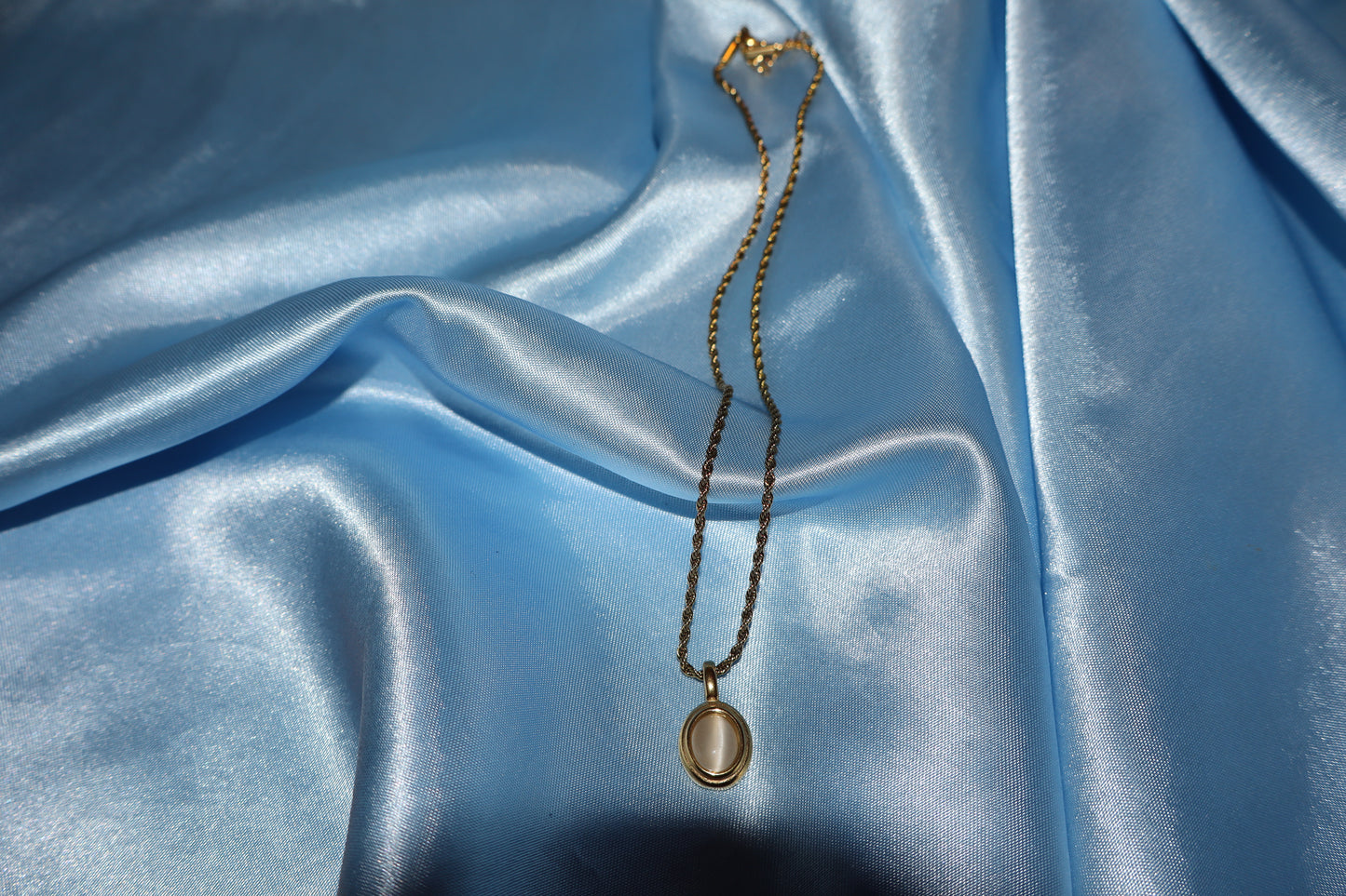 white stone pendant gold necklace