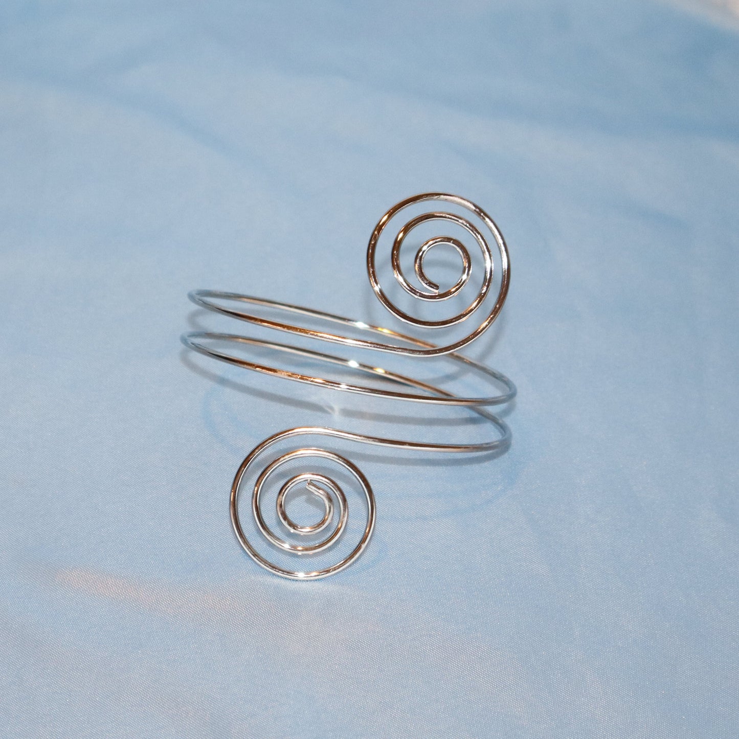 double swirl arm cuff silver